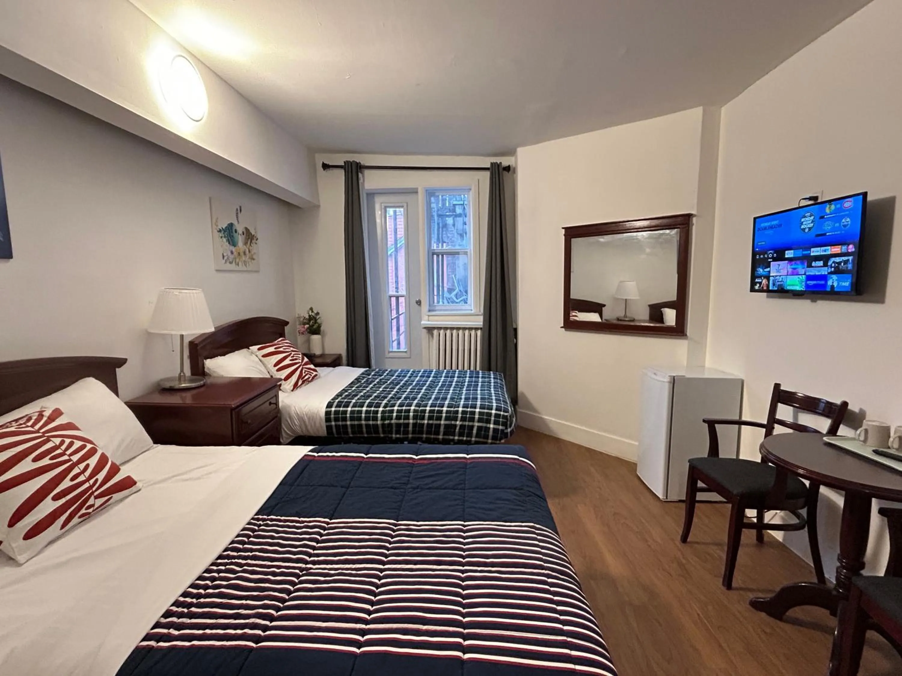 Bed in Hotel La Residence du Voyageur