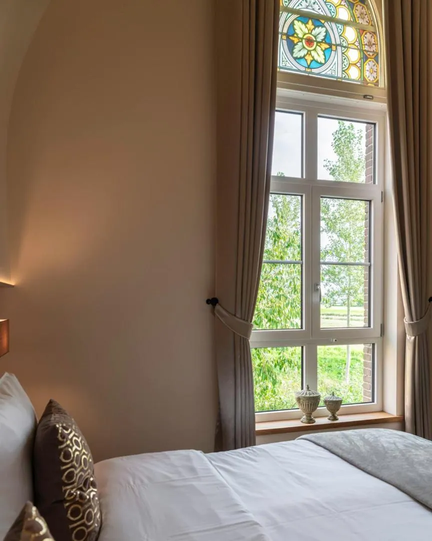 Bed in KerkHotel Biervliet