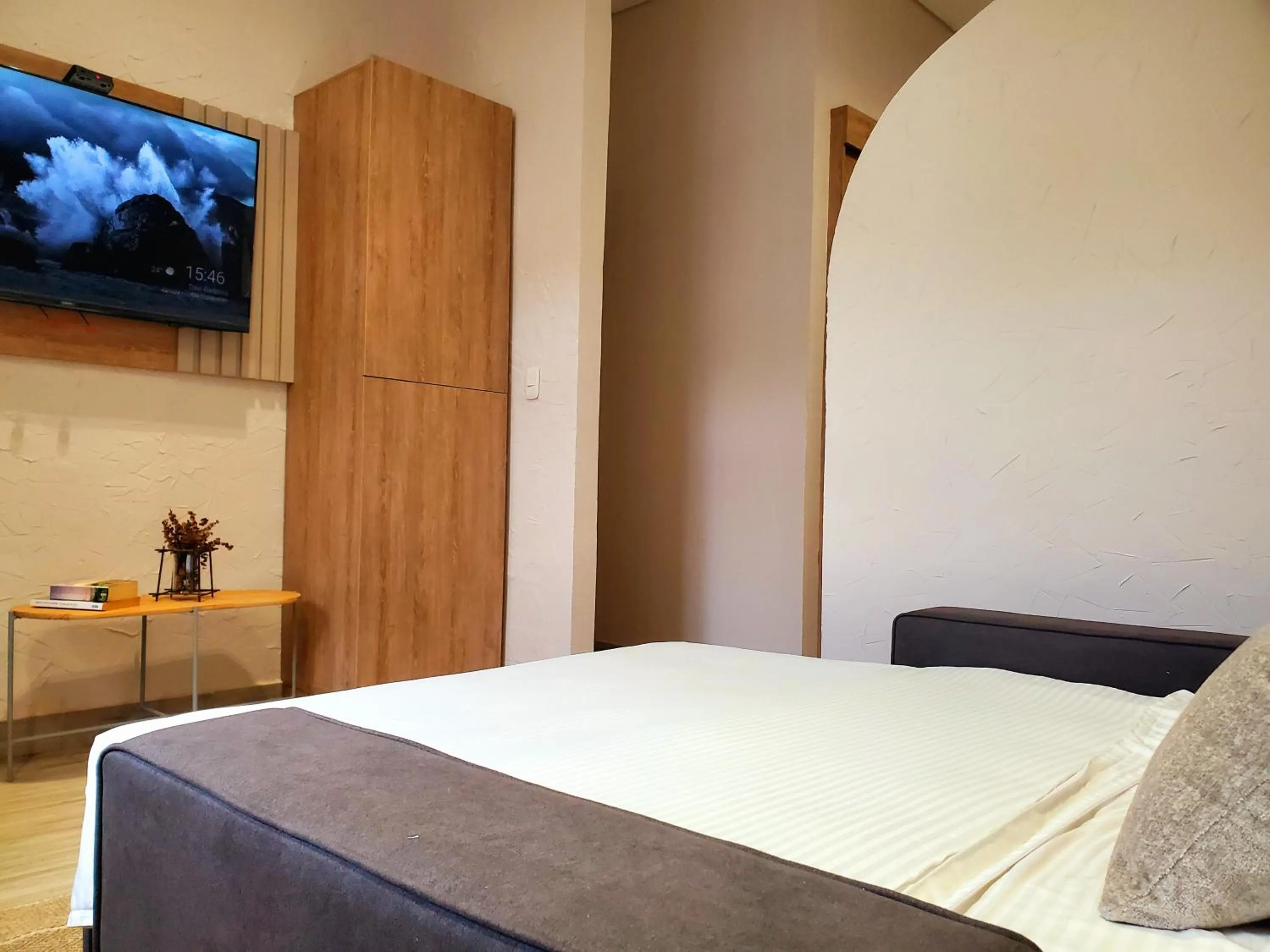 Photo of the whole room, Bed in Zentrico Boutique