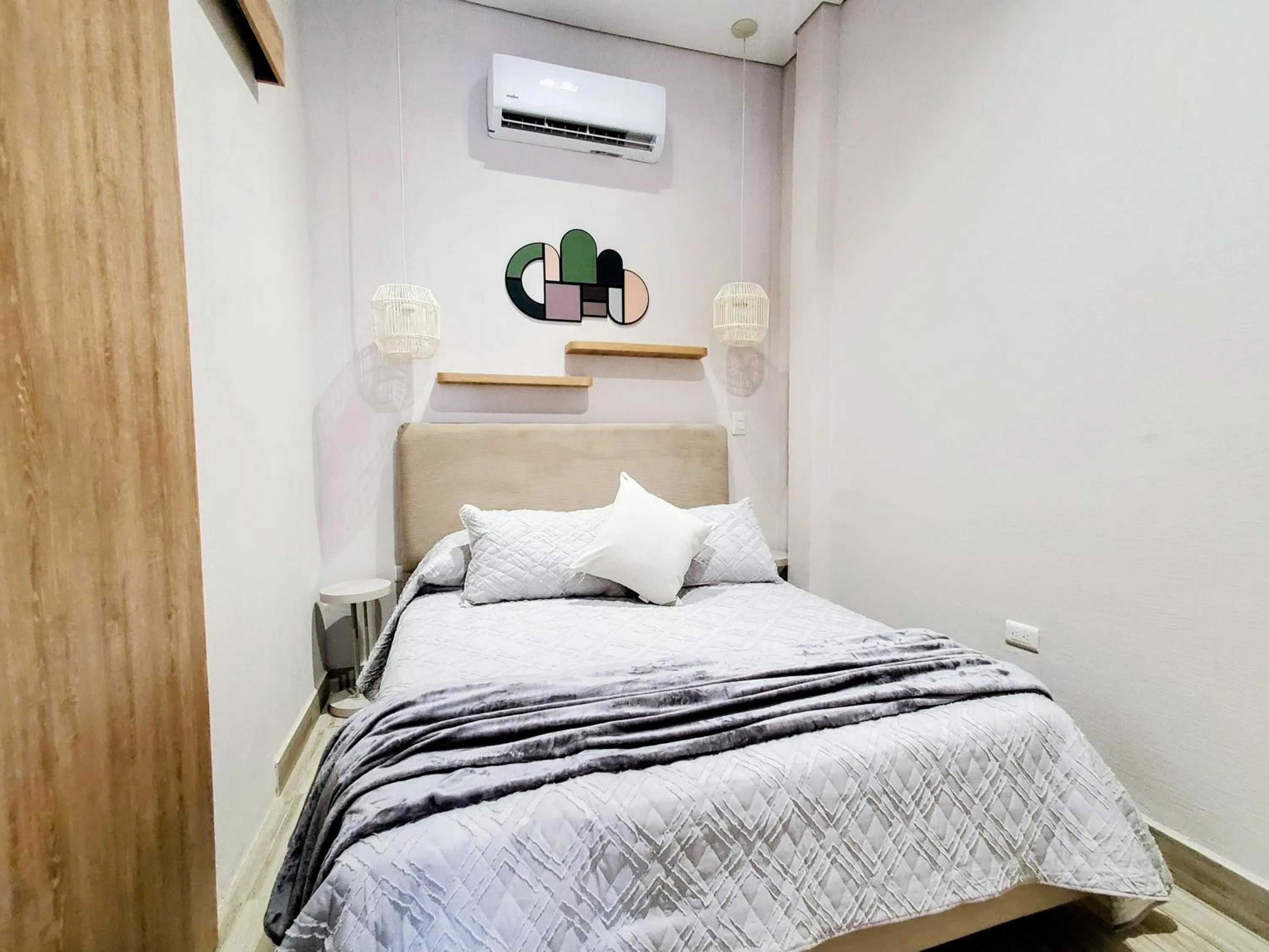 Photo of the whole room, Bed in Zentrico Boutique