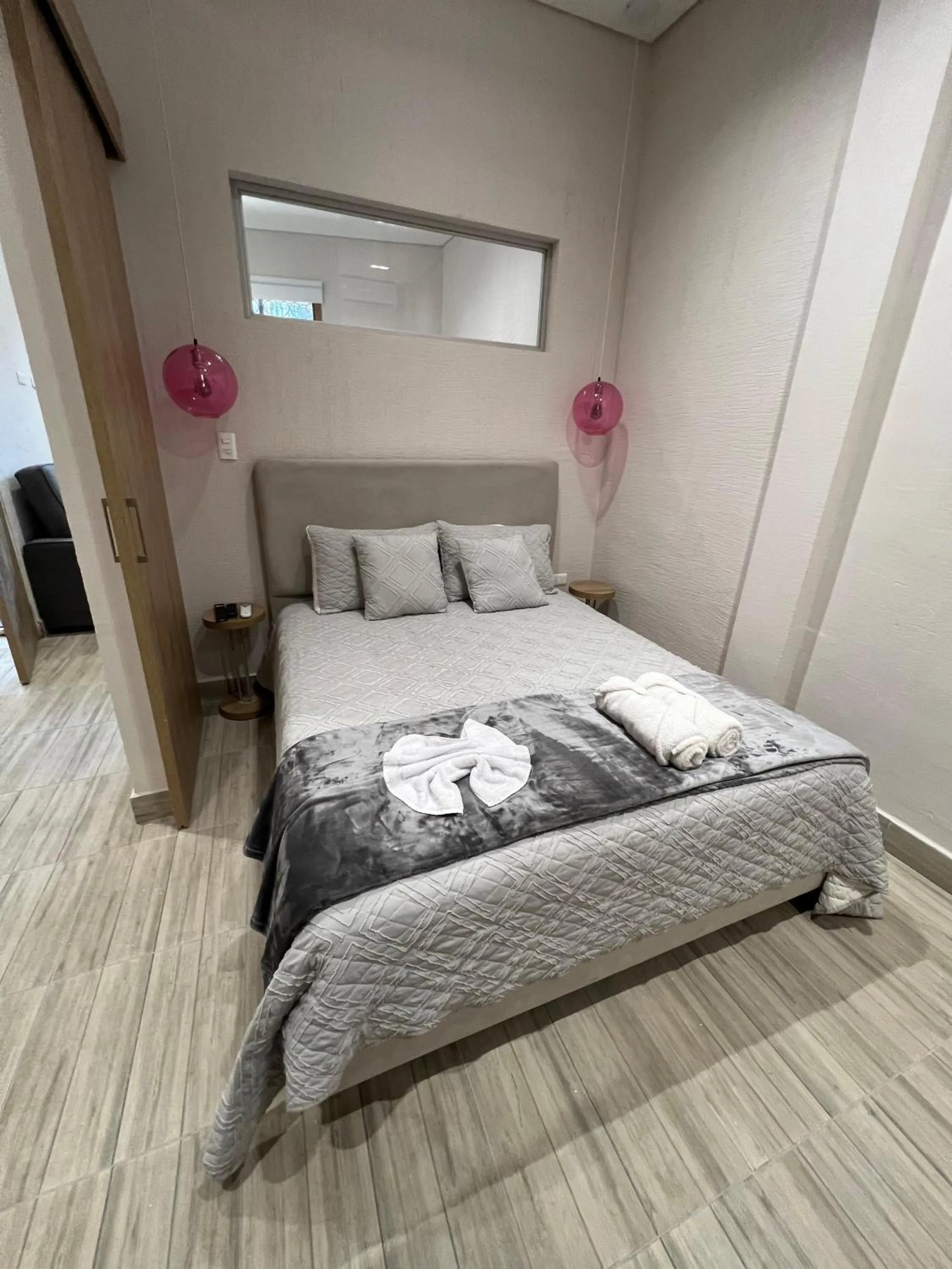 Photo of the whole room, Bed in Zentrico Boutique