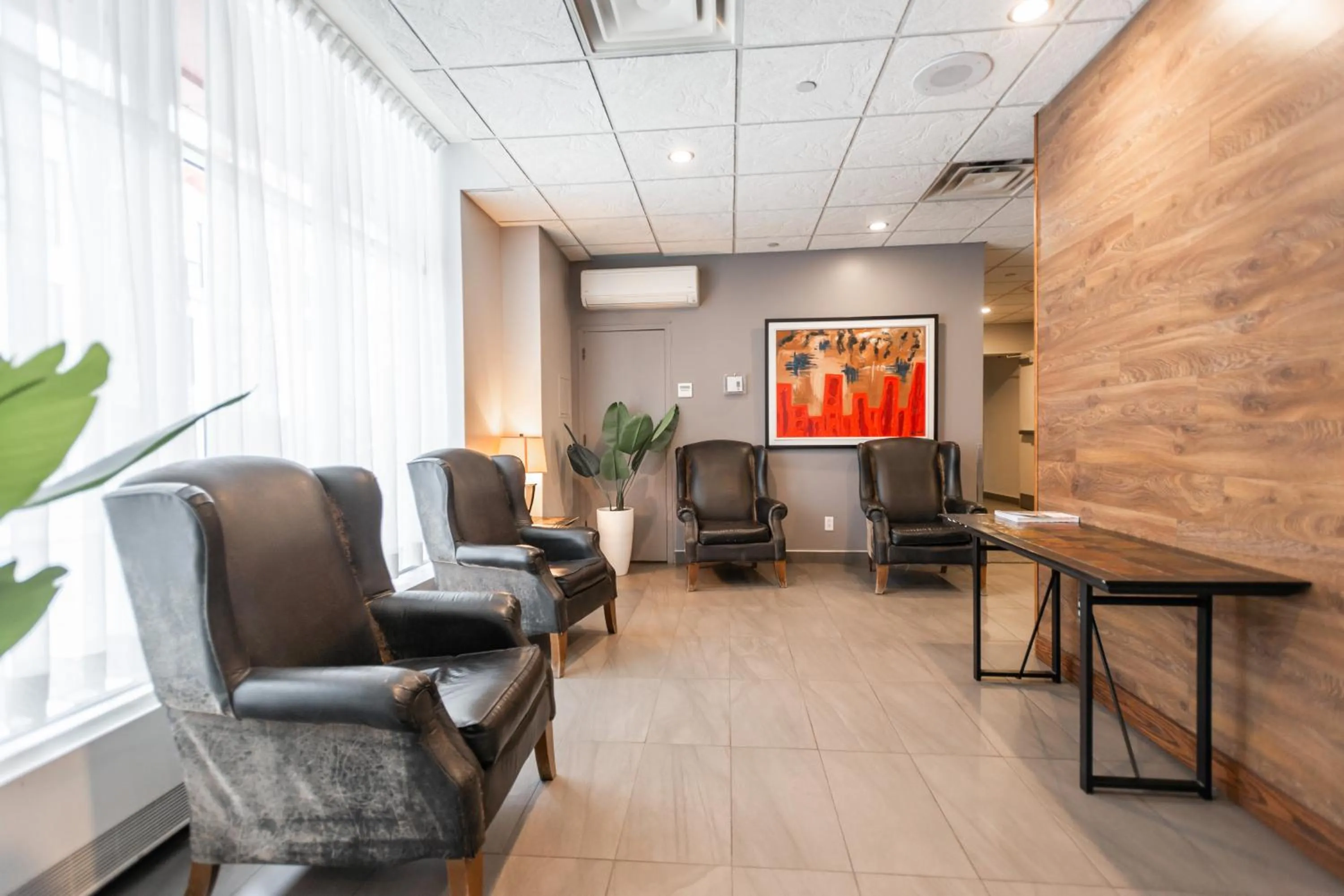 Lobby or reception in Hotel les Suites Labelle