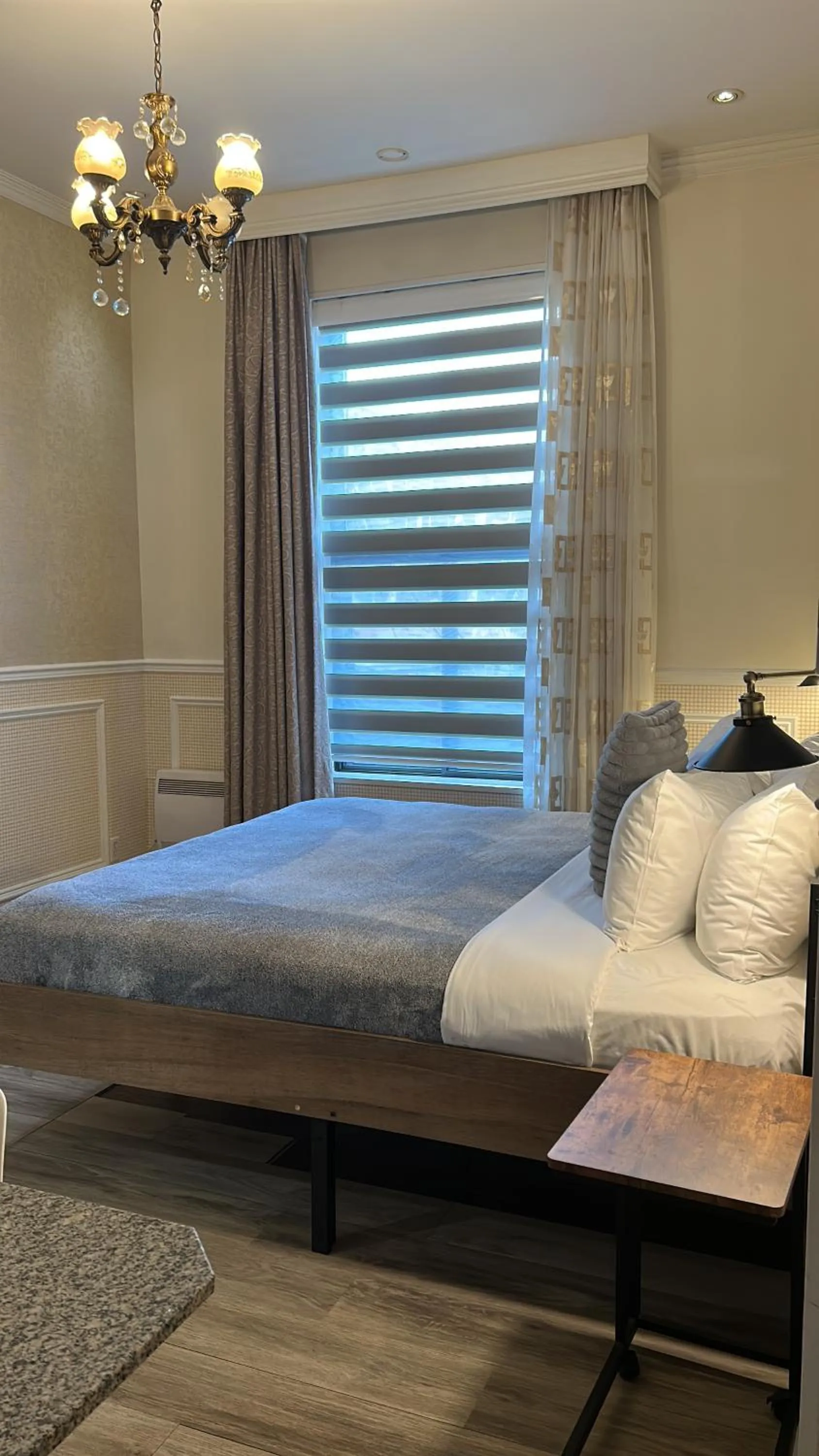 Bed in Parc Suites Hotel