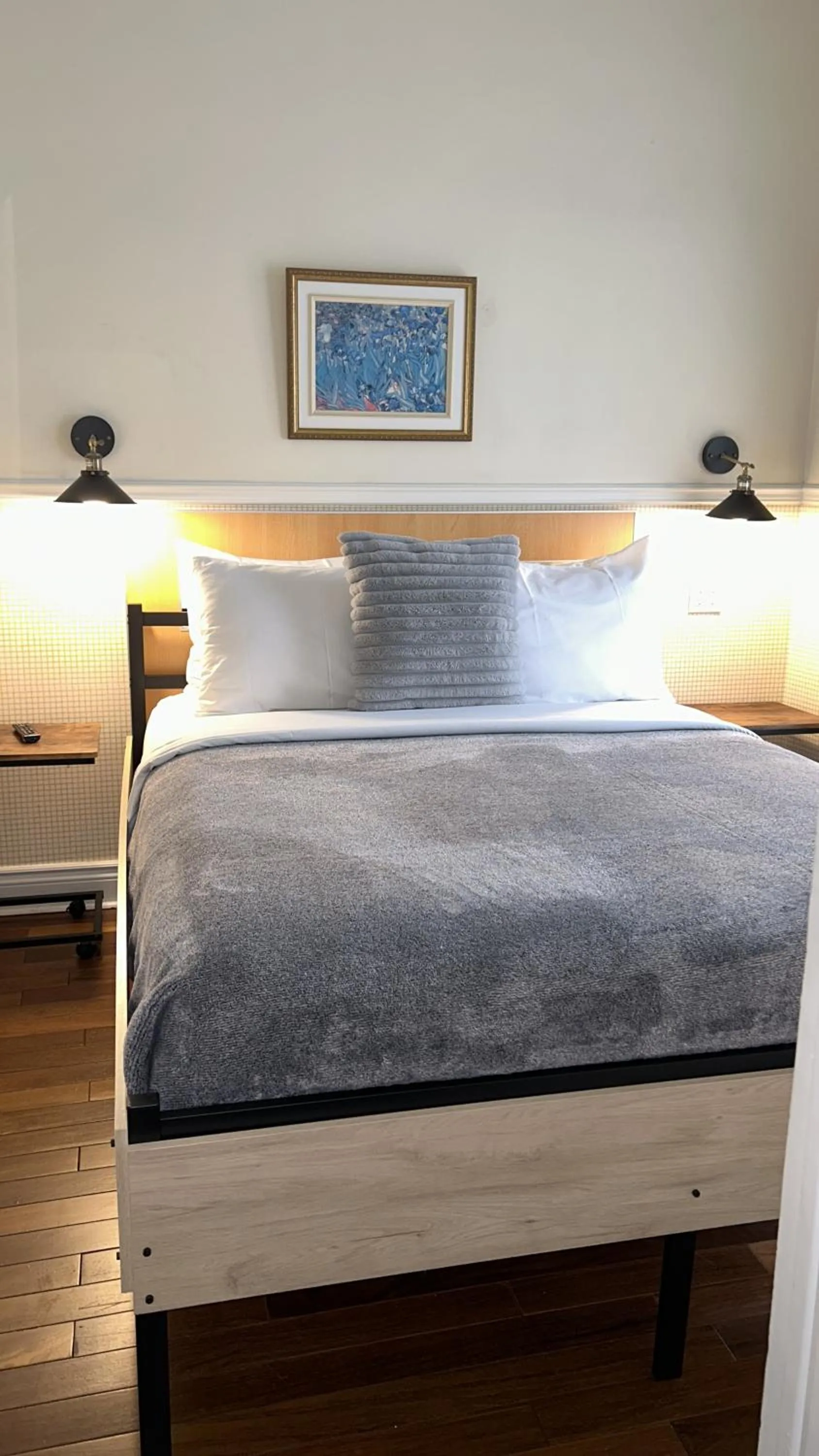 Bed in Parc Suites Hotel