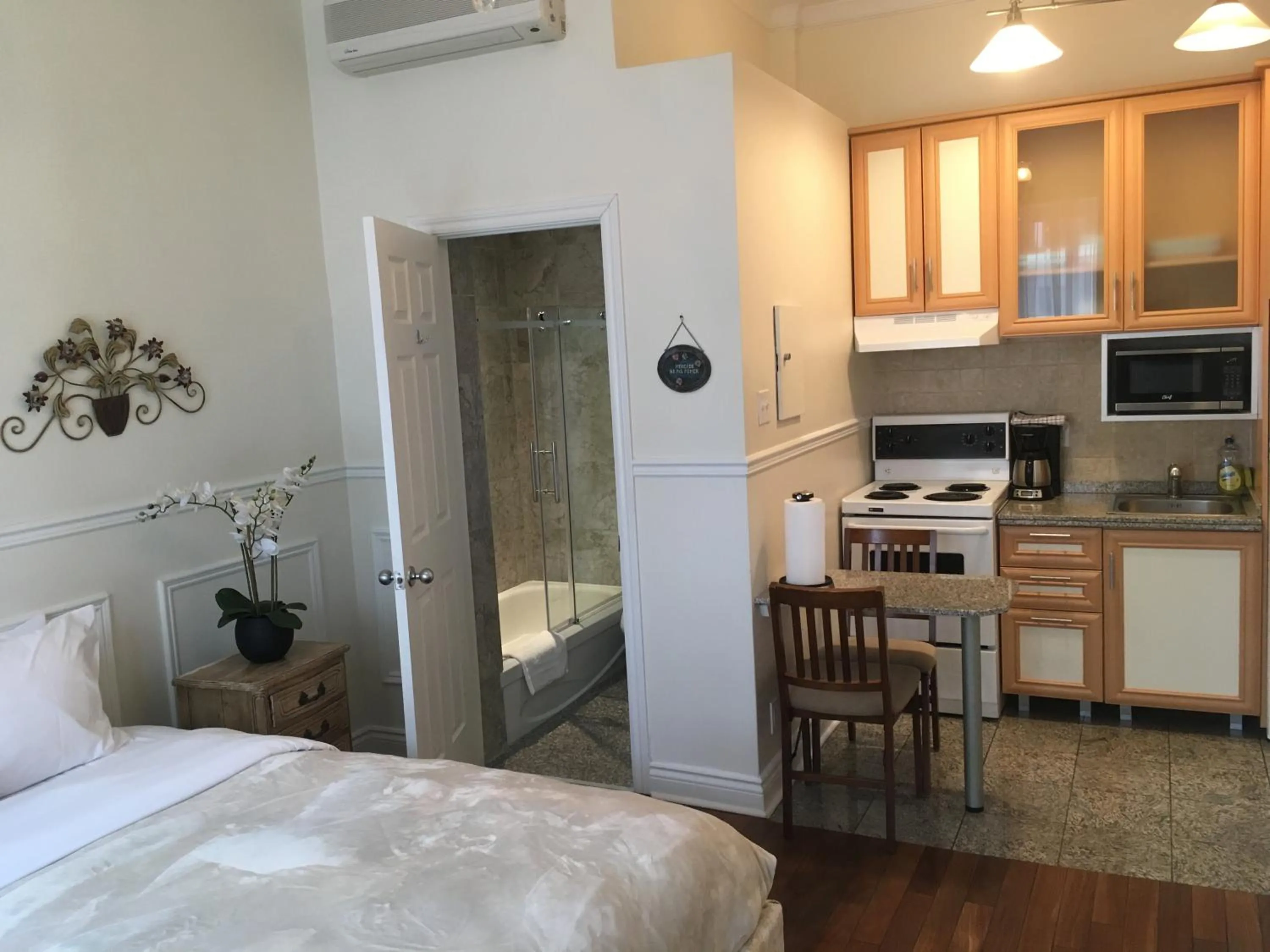 Bed in Parc Suites Hotel