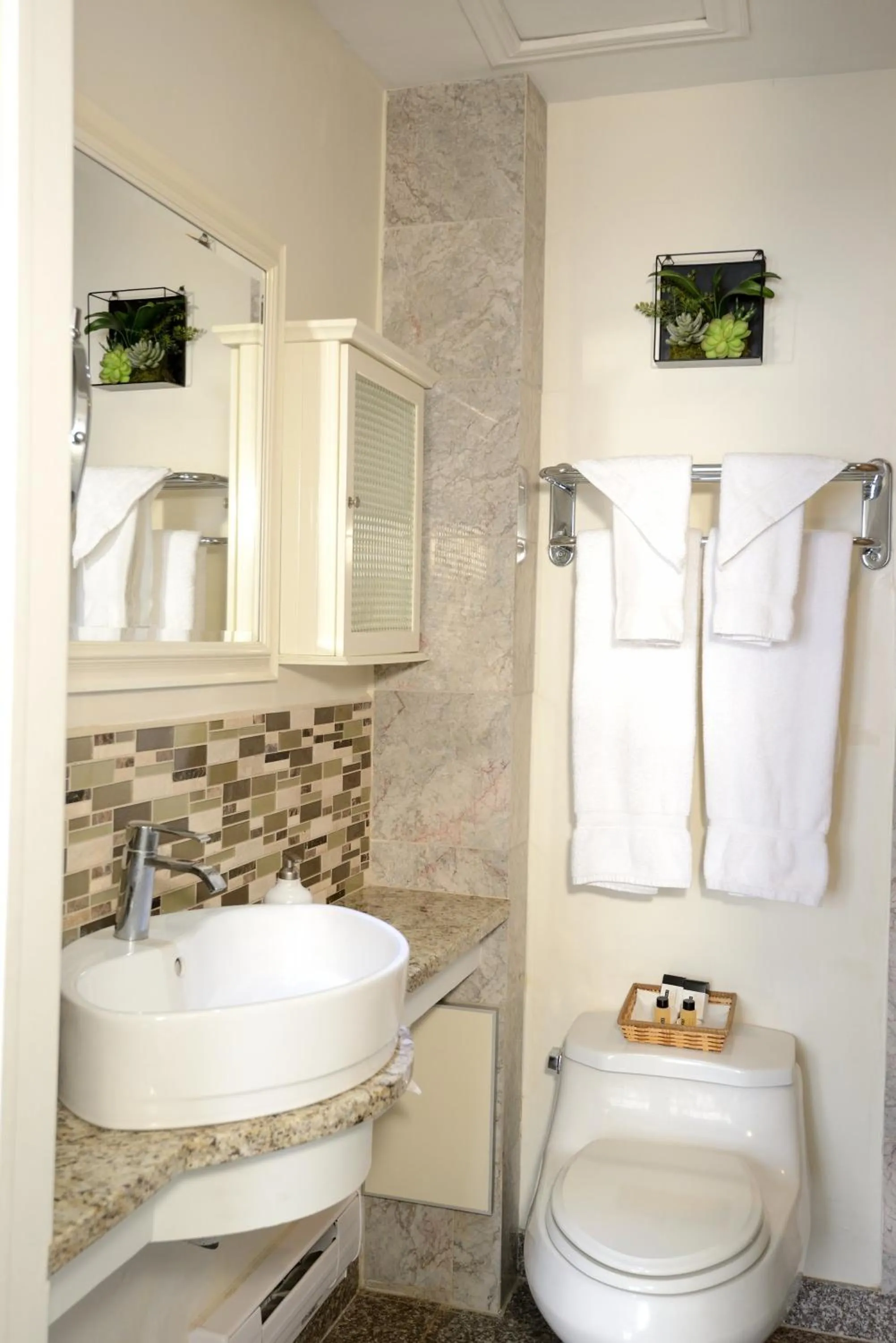 Bathroom in Parc Suites Hotel