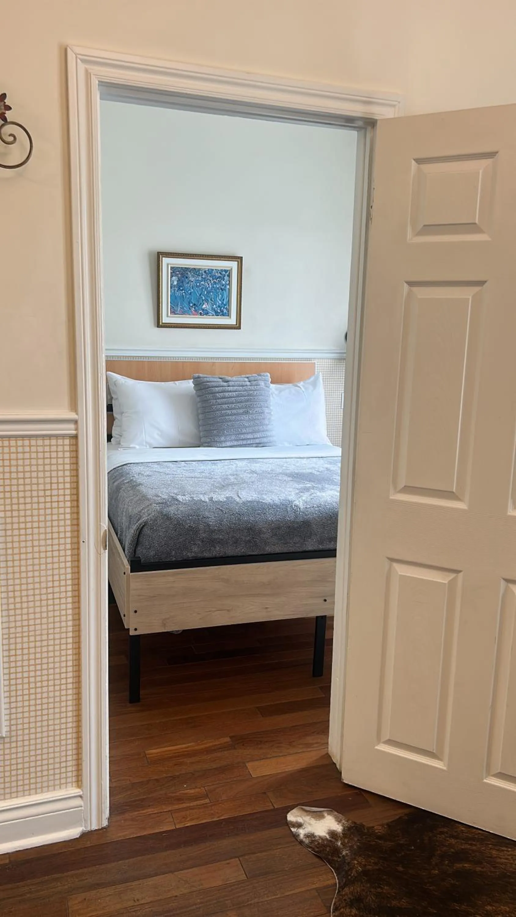 Bed in Parc Suites Hotel