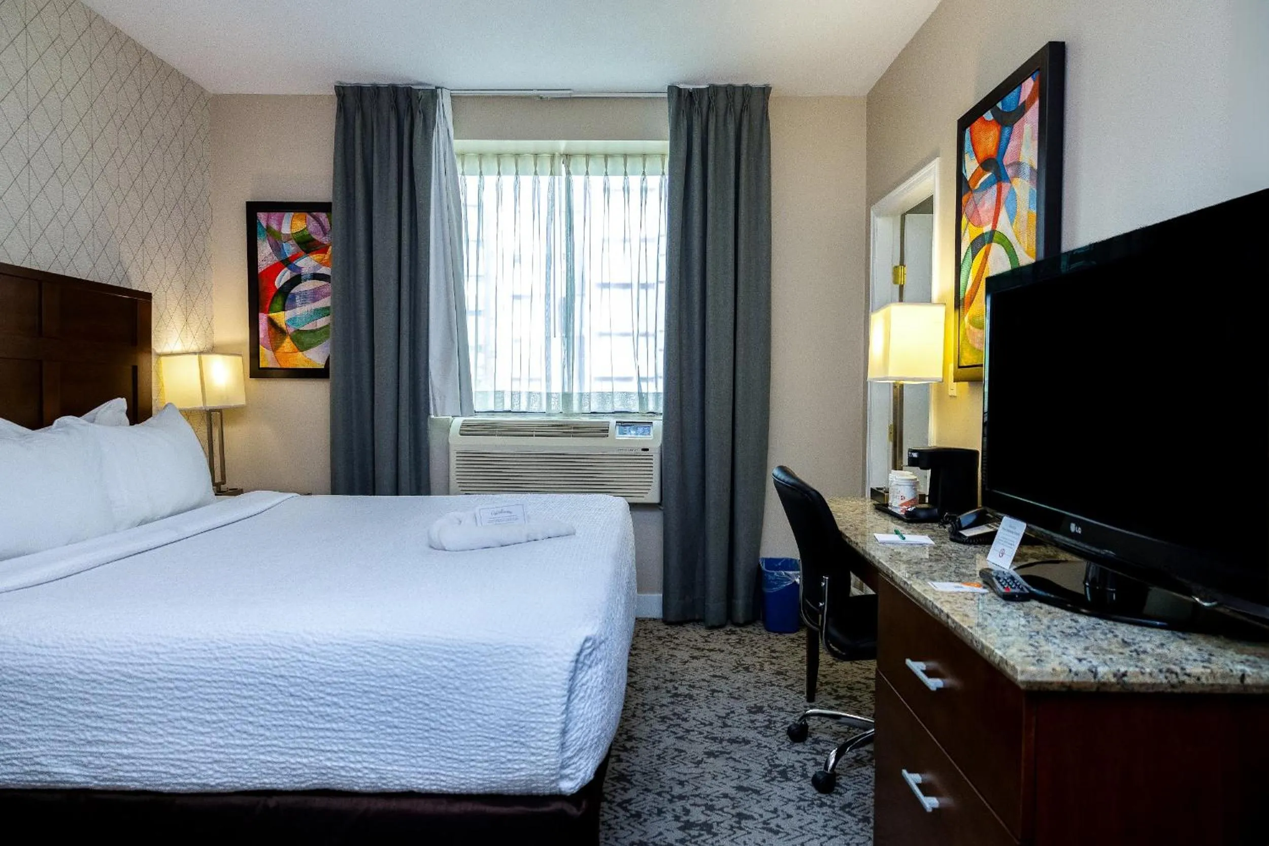 Bed in Quality Inn & Suites