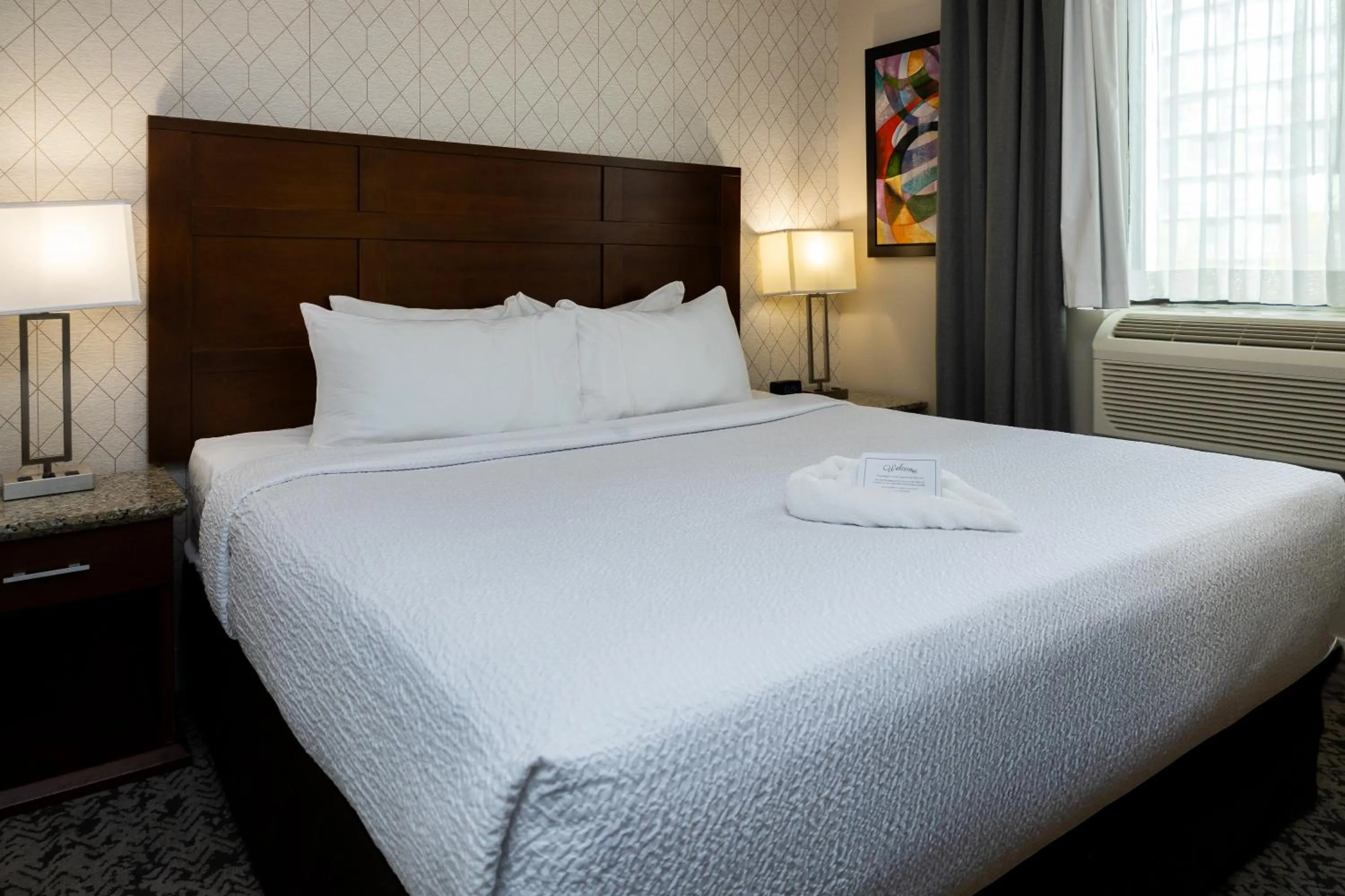 Bed in Quality Inn & Suites