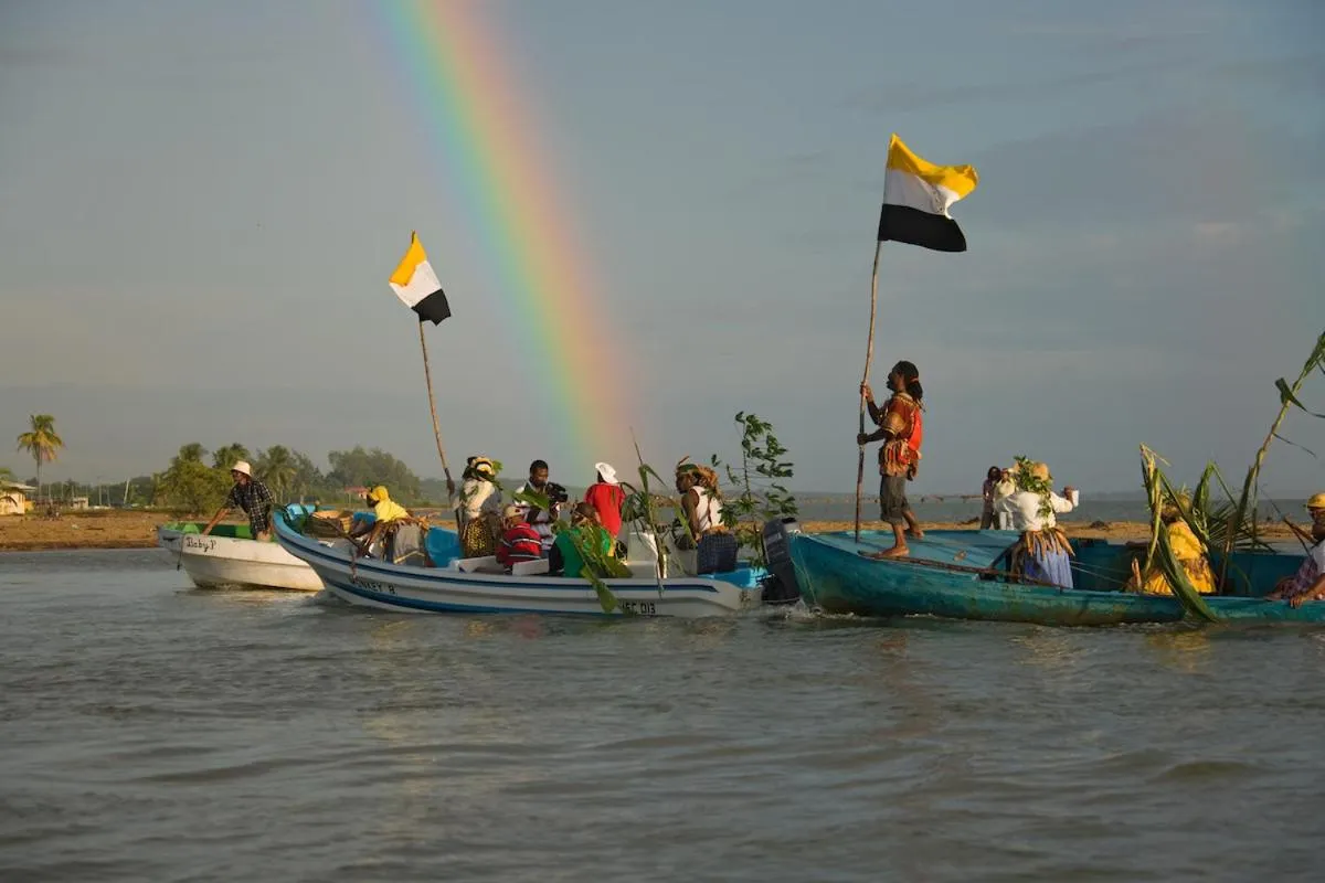 People in Pelican Beach Resort South Water Caye