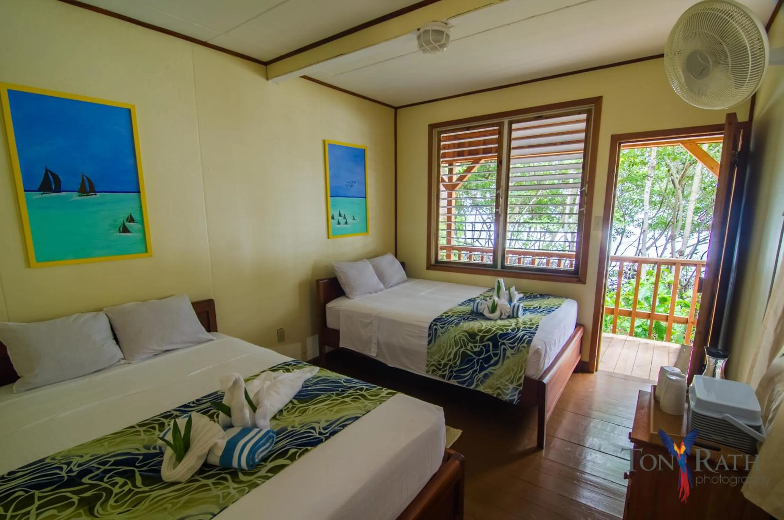 Bed in Pelican Beach Resort South Water Caye
