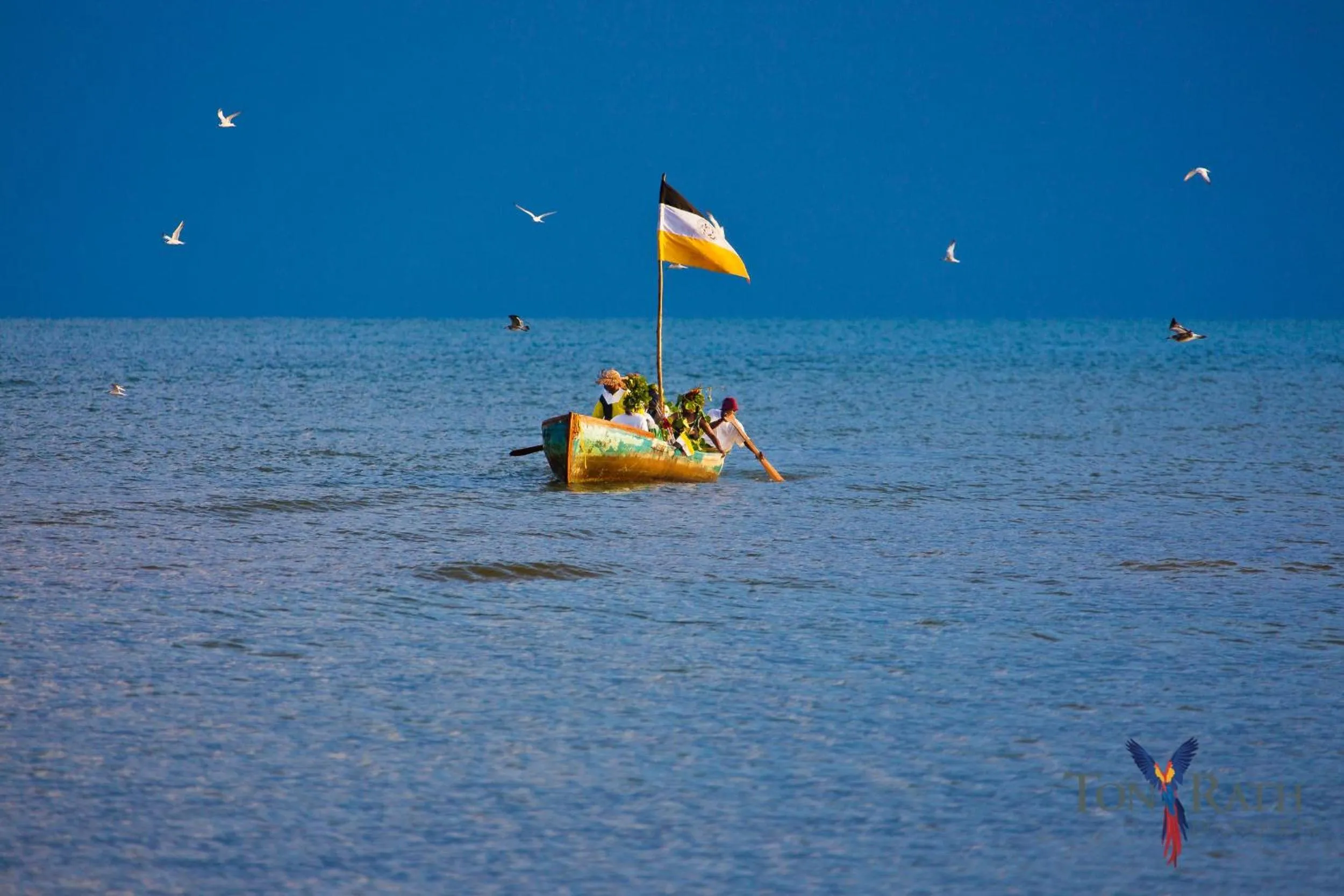 People in Pelican Beach Resort South Water Caye