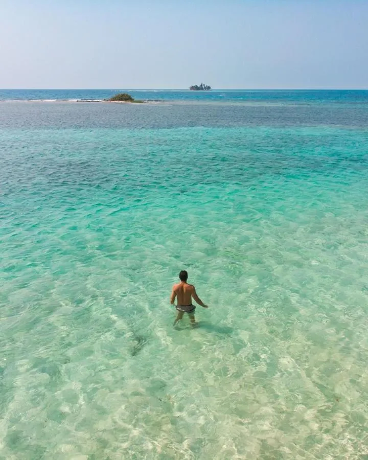 People in Pelican Beach Resort South Water Caye