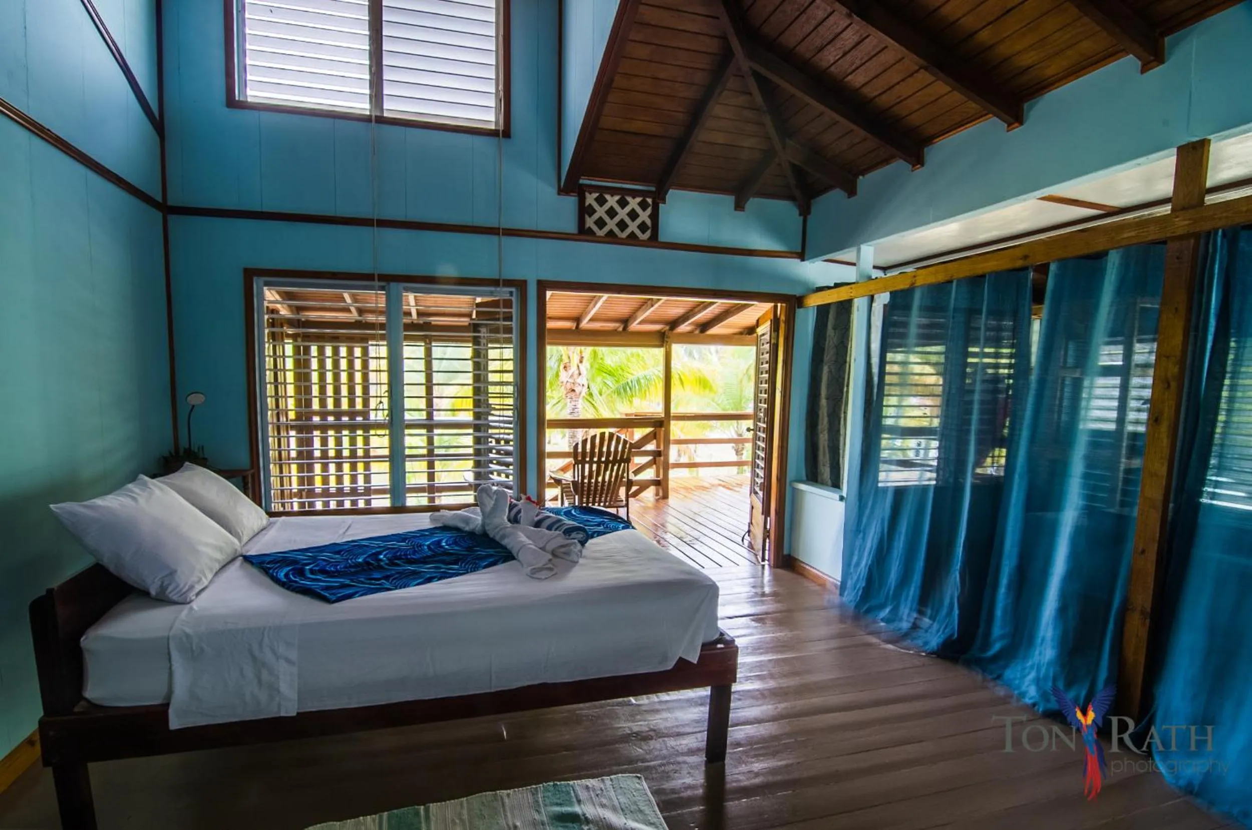 Bedroom, Bed in Pelican Beach Resort South Water Caye