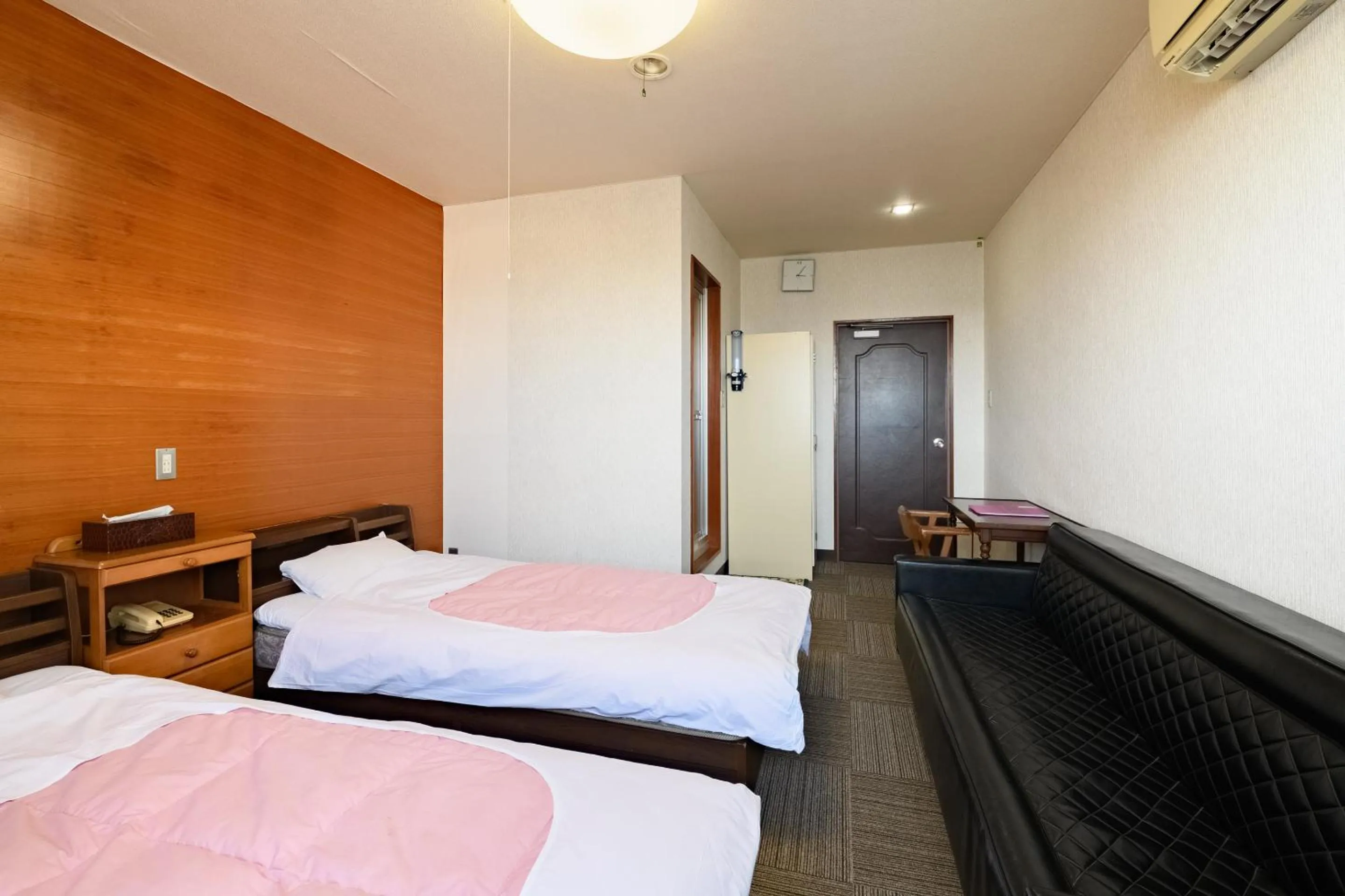 Bed in Tabist HotelNakajima Fuji