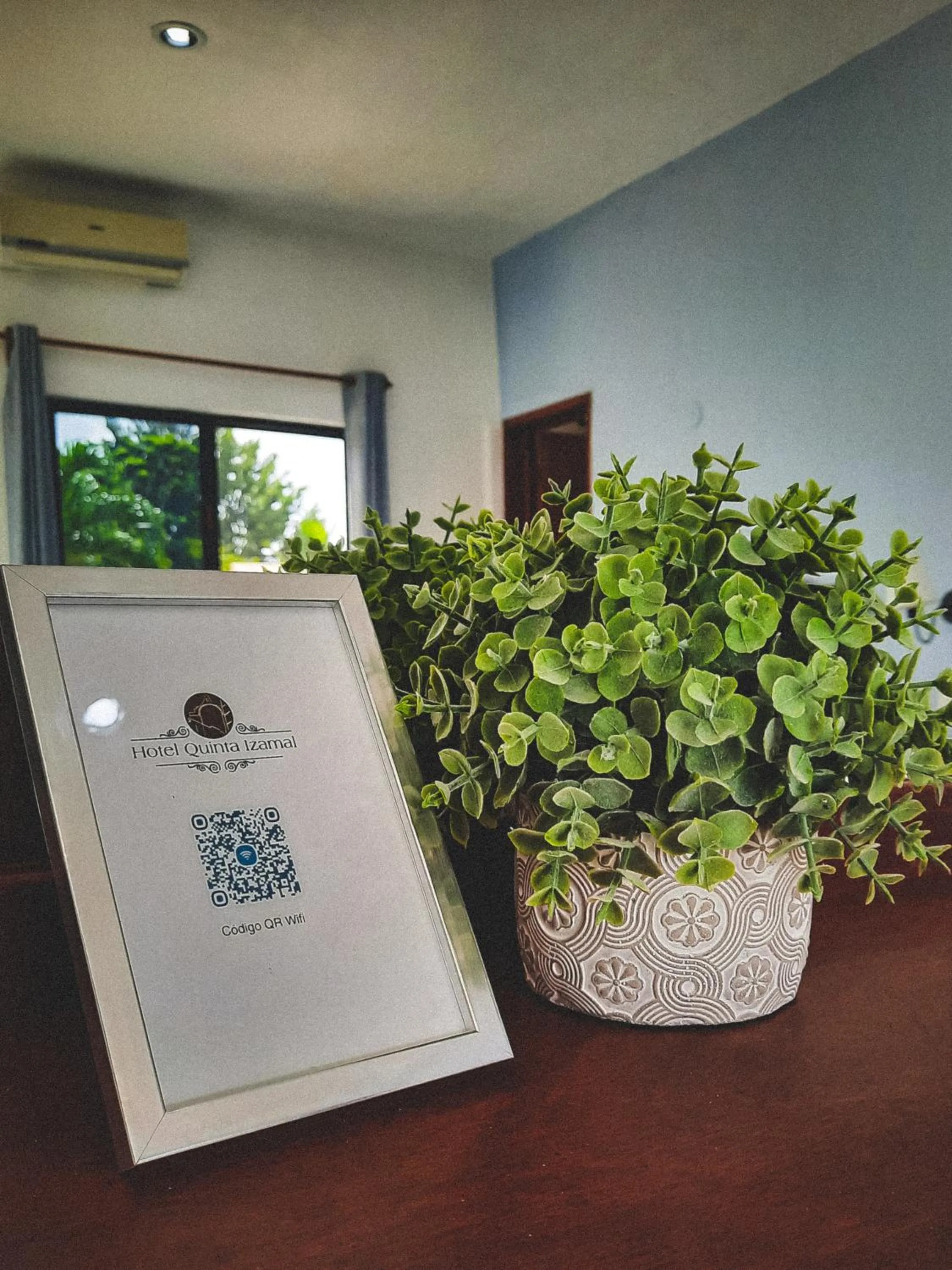 Property logo or sign in Hotel Quinta Izamal