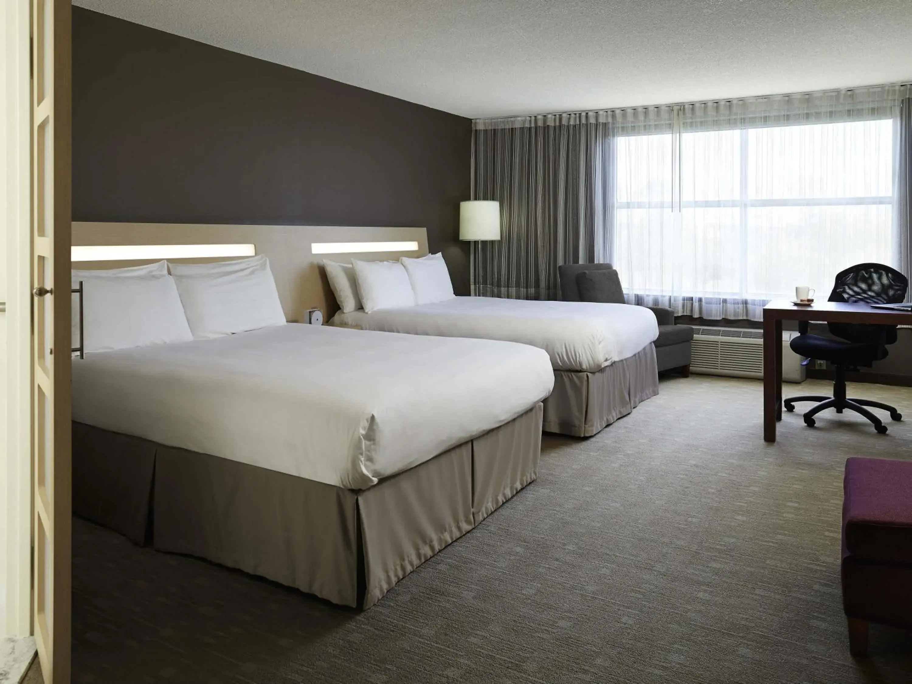 Superior Room with Two Queen Beds in Novotel Montréal Aéroport Superior Room with Two Queen Beds in Novotel Montréal Aéroport