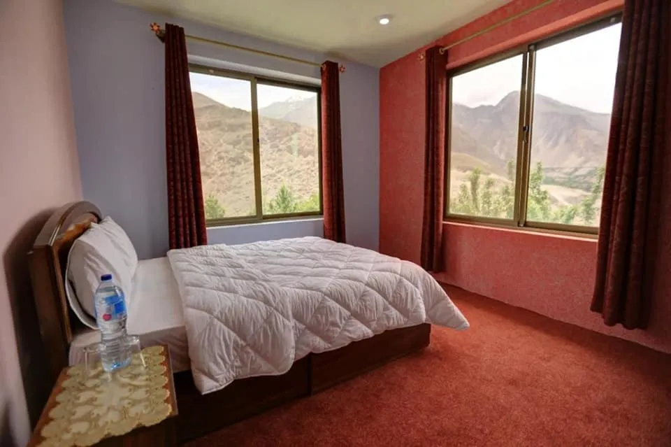 Bed in MasakAli Family Guest House