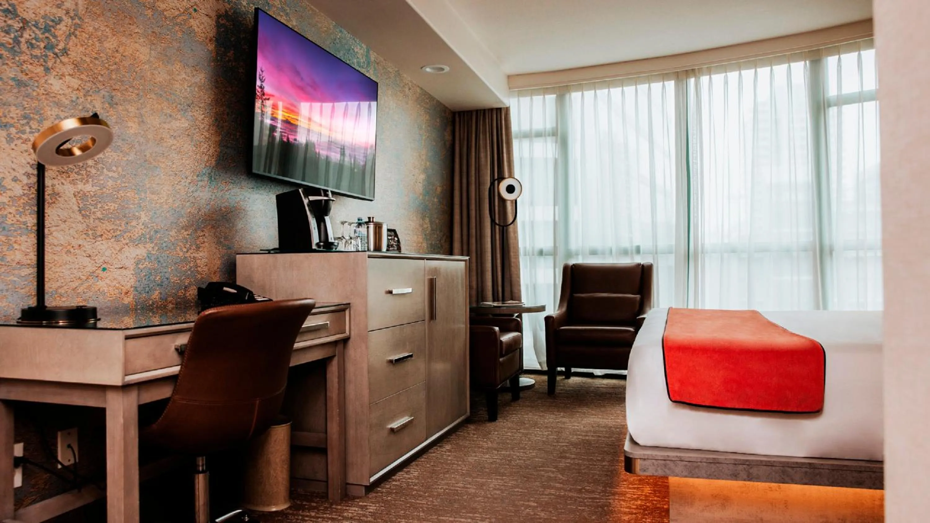 Bed in The Parker Hotel and Rooftop