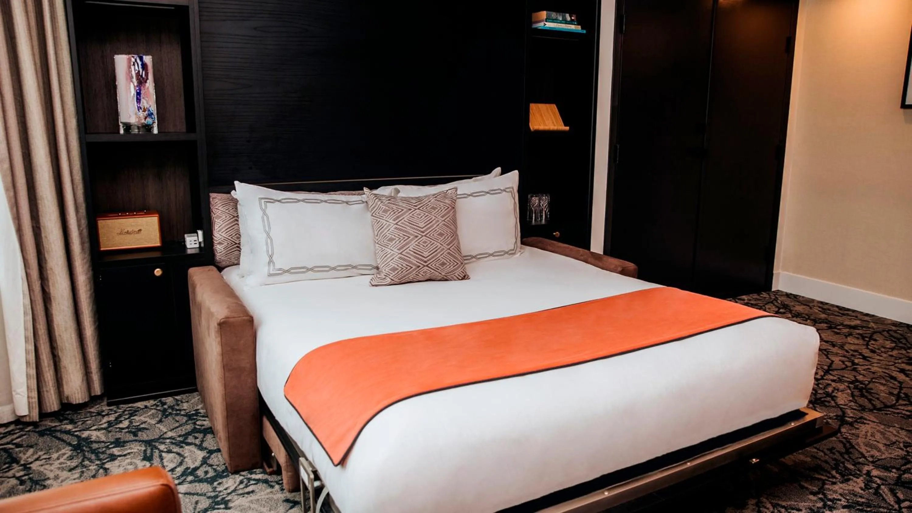 Bed in The Parker Hotel and Rooftop