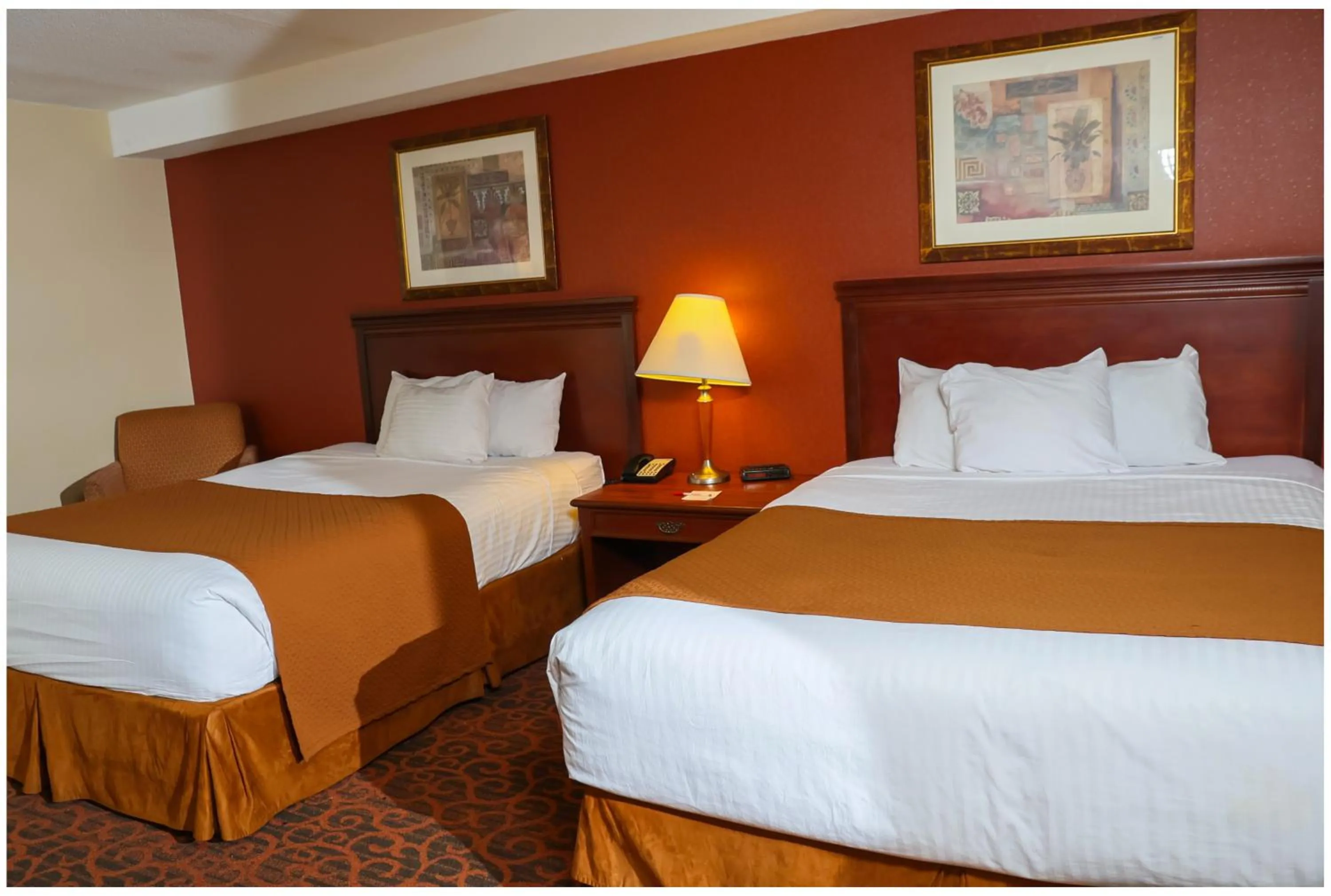 Bedroom, Bed in Ramada by Wyndham Niagara Falls/Fallsview