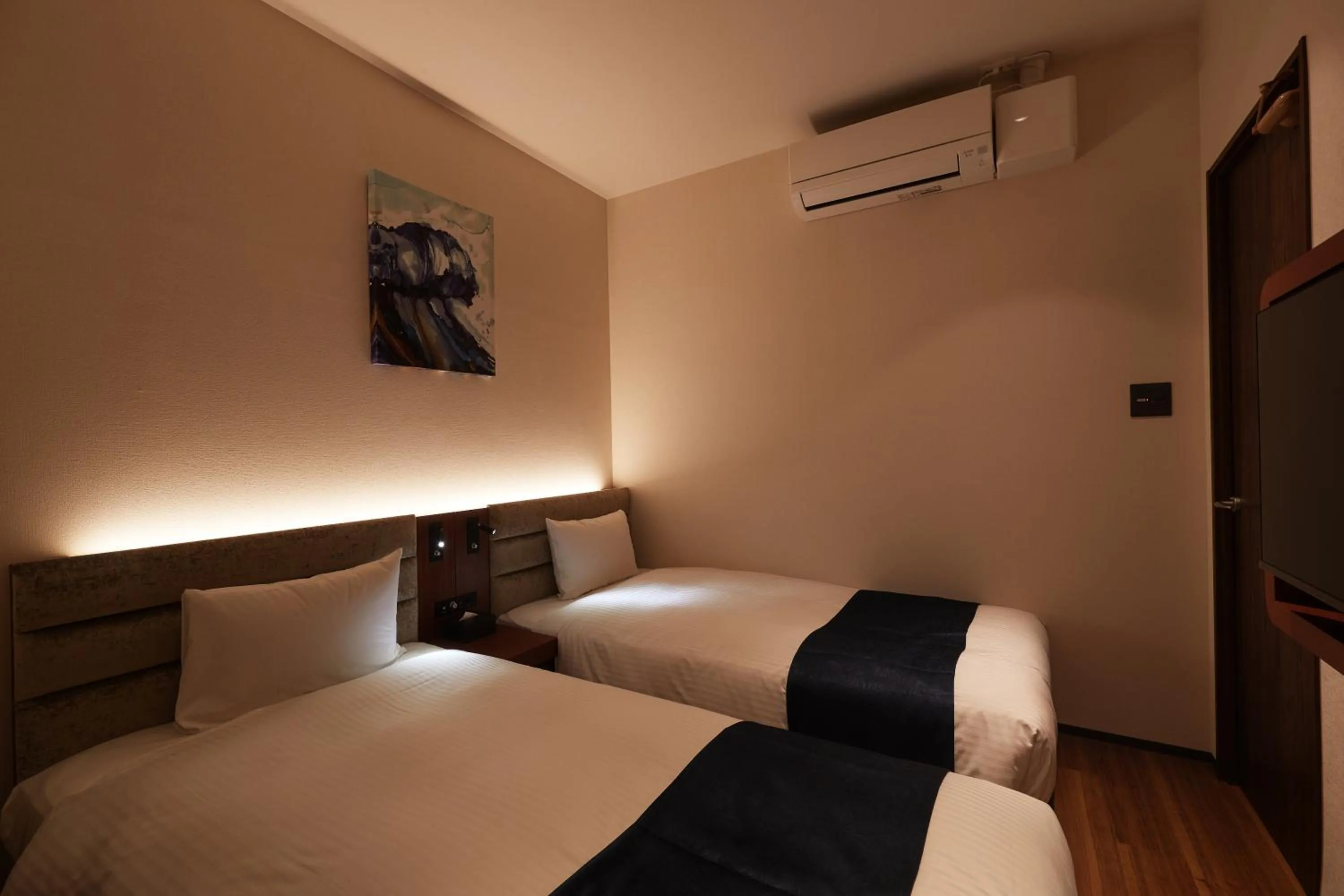 Photo of the whole room, Bed in THE GRAND HOTEL GINOWAN