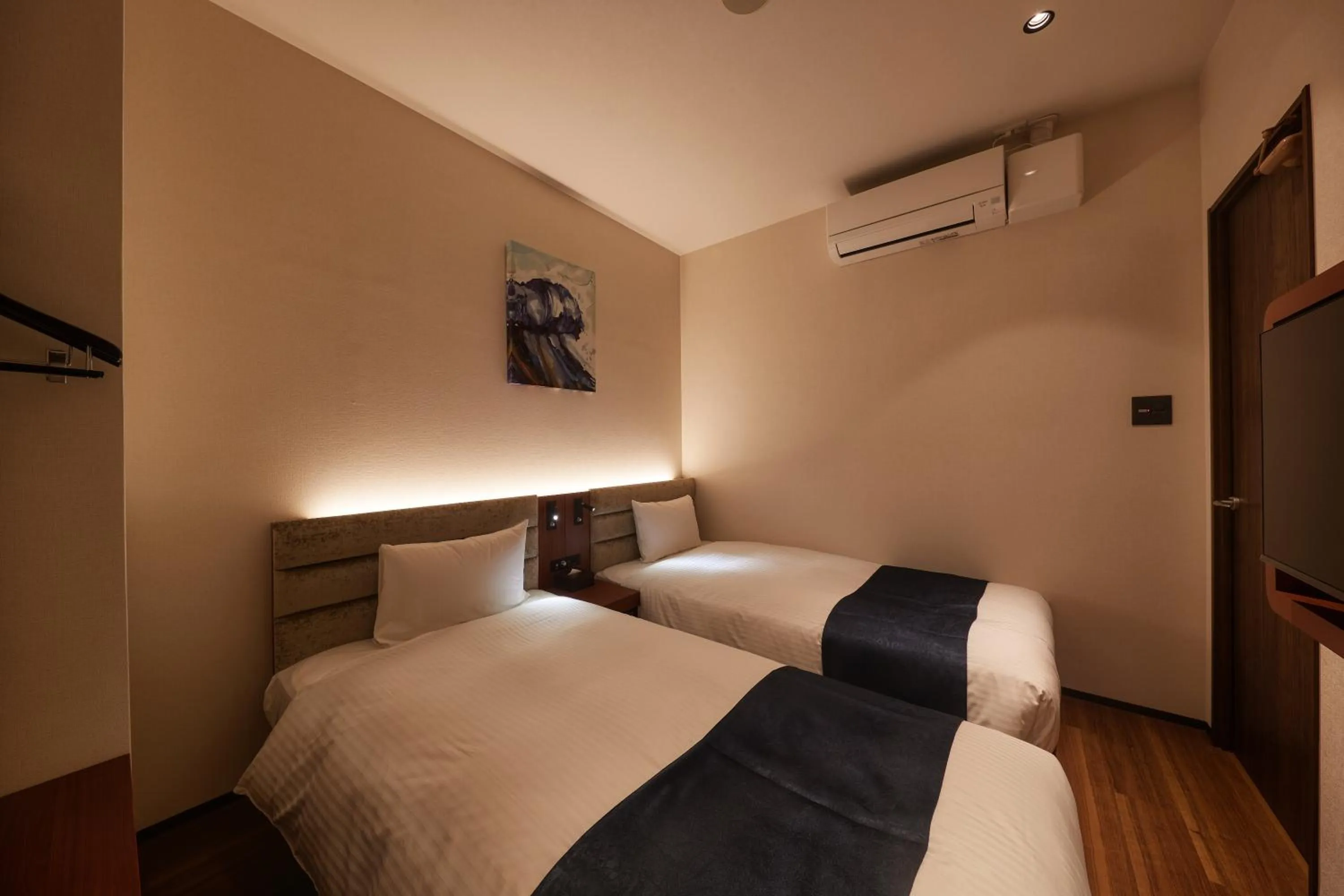 Photo of the whole room, Bed in THE GRAND HOTEL GINOWAN