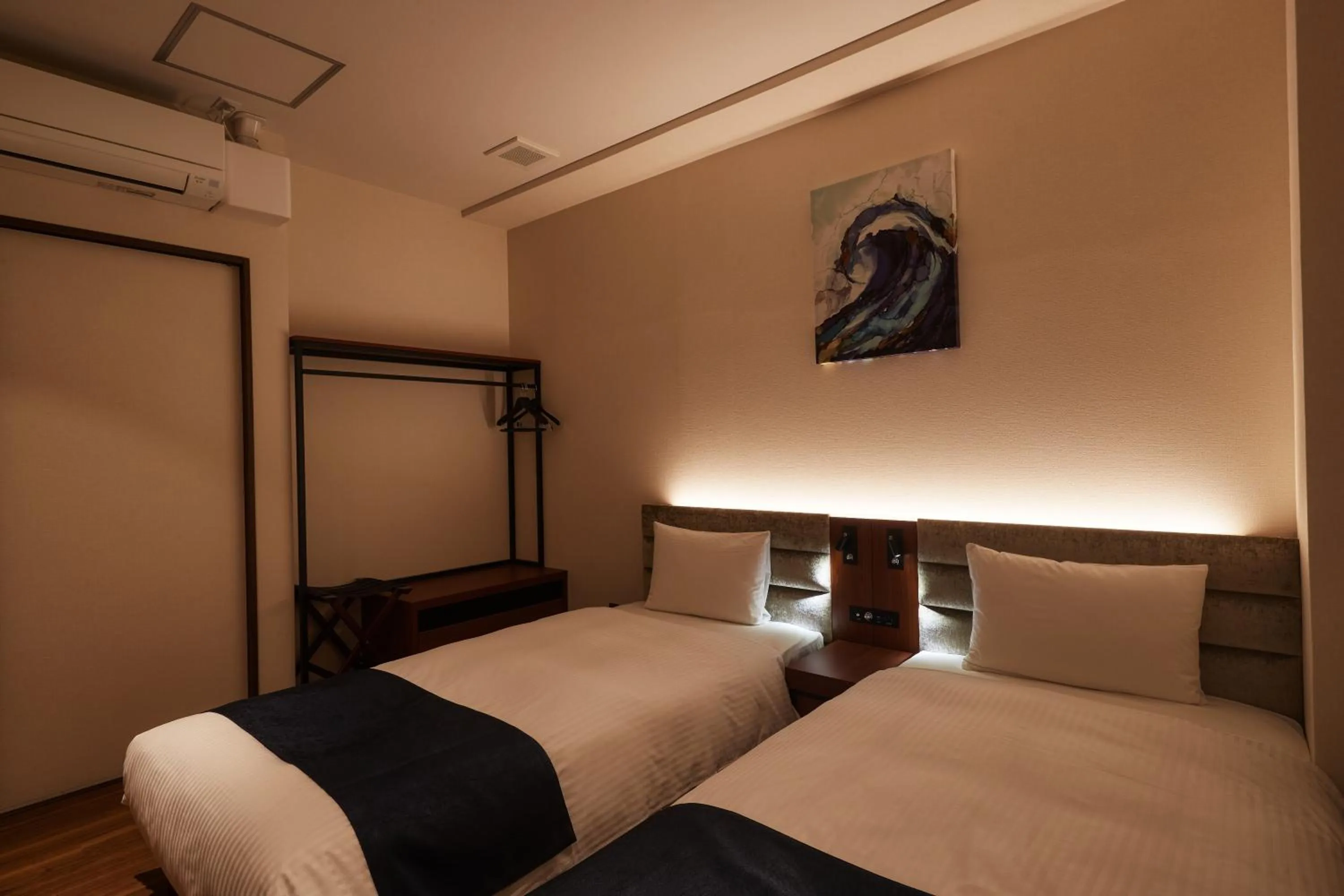 Photo of the whole room, Bed in THE GRAND HOTEL GINOWAN