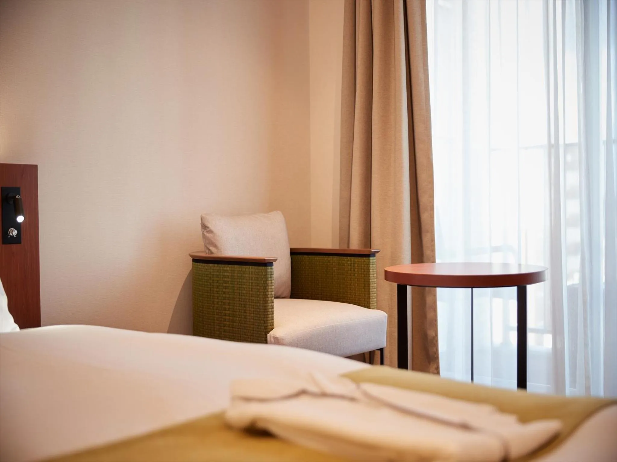 Photo of the whole room, Bed in THE GRAND HOTEL GINOWAN