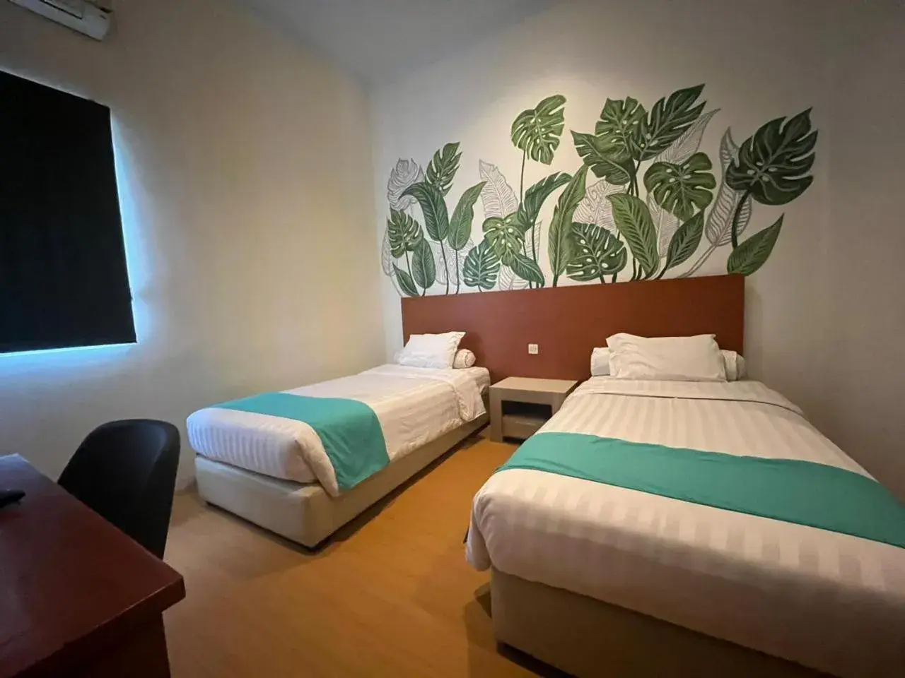 Deluxe Twin Room in Front One Green Boutique Hotel Abepura Deluxe Twin Room in Front One Green Boutique Hotel Abepura