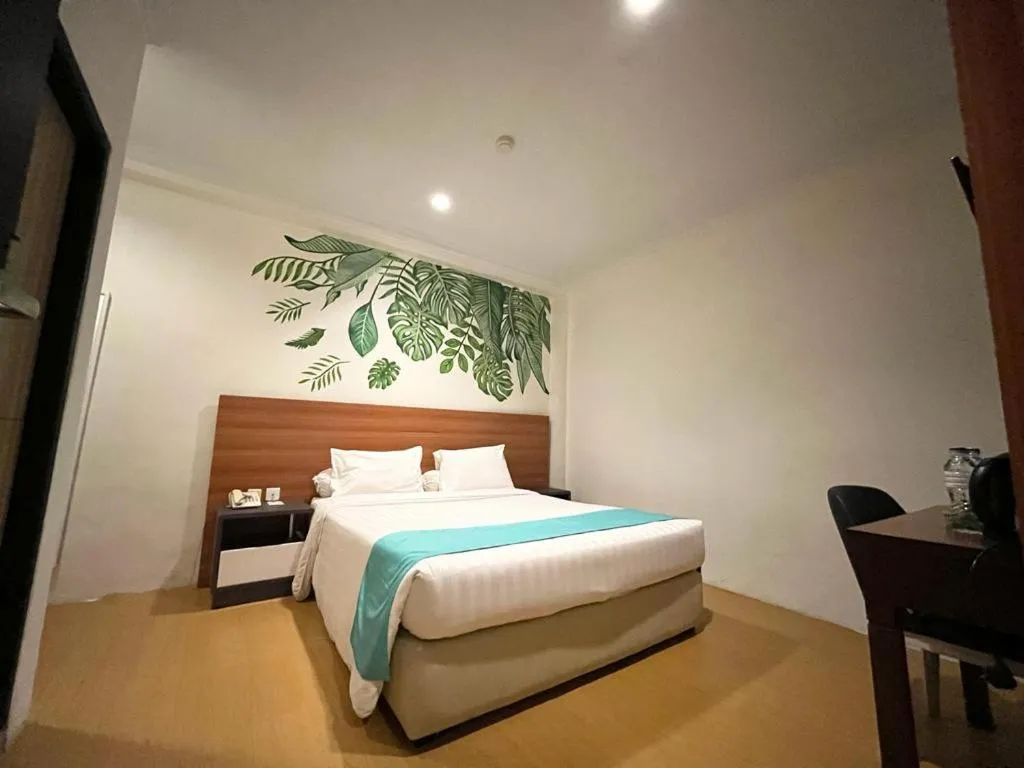 Bed in Front One Green Boutique Hotel Abepura