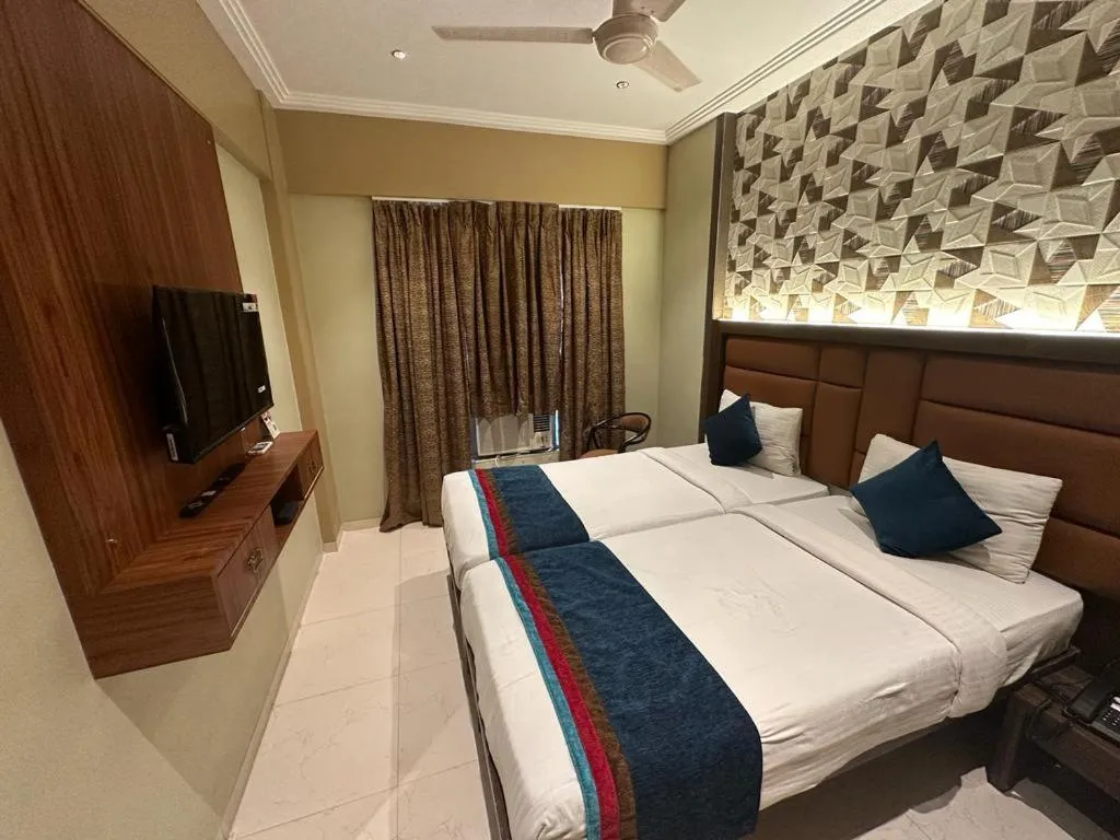 TV and multimedia, Bed in SriKrishna Paradise Hotel Thane Navi Mumbai