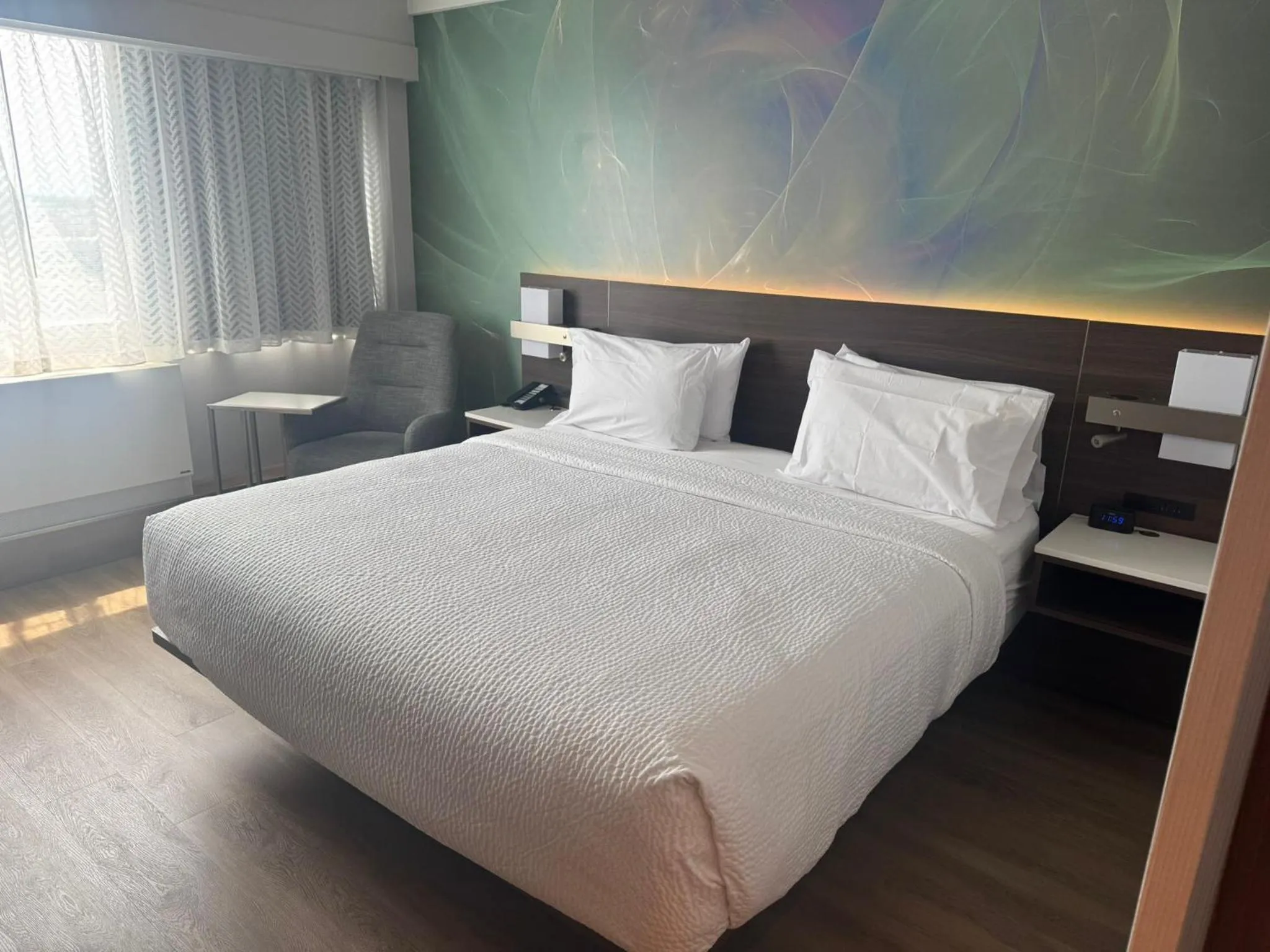 Bed in Armon Plaza Montreal Airpt, Trademark Collection by Wyndham