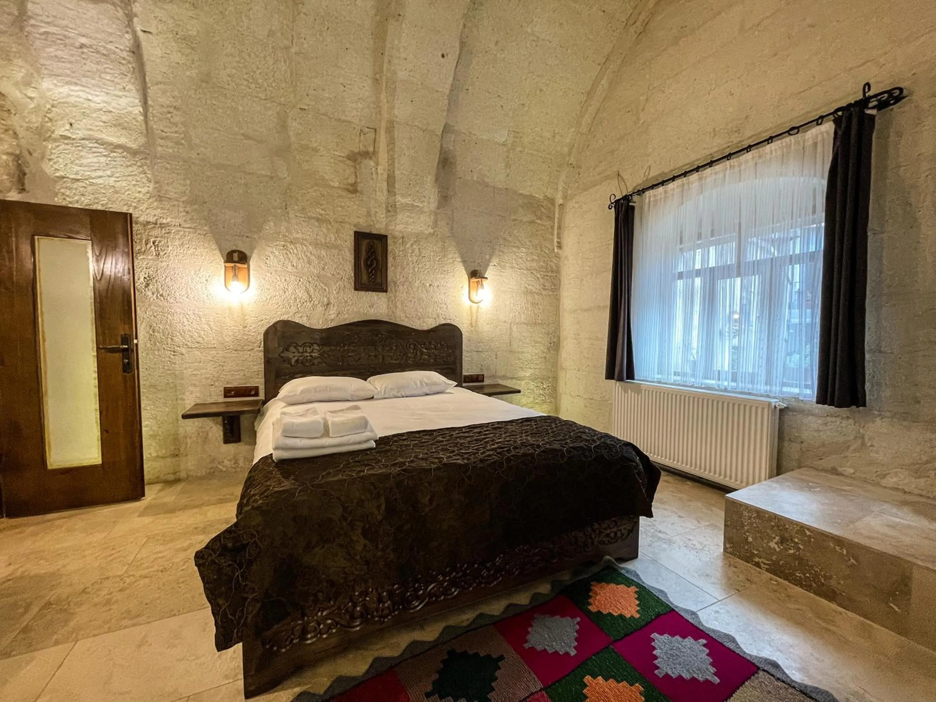 Bed in Takunya Cave Hotel