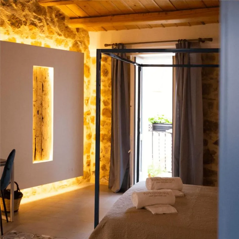 Bed in PORTA SOPRANA luxury guest House & spa