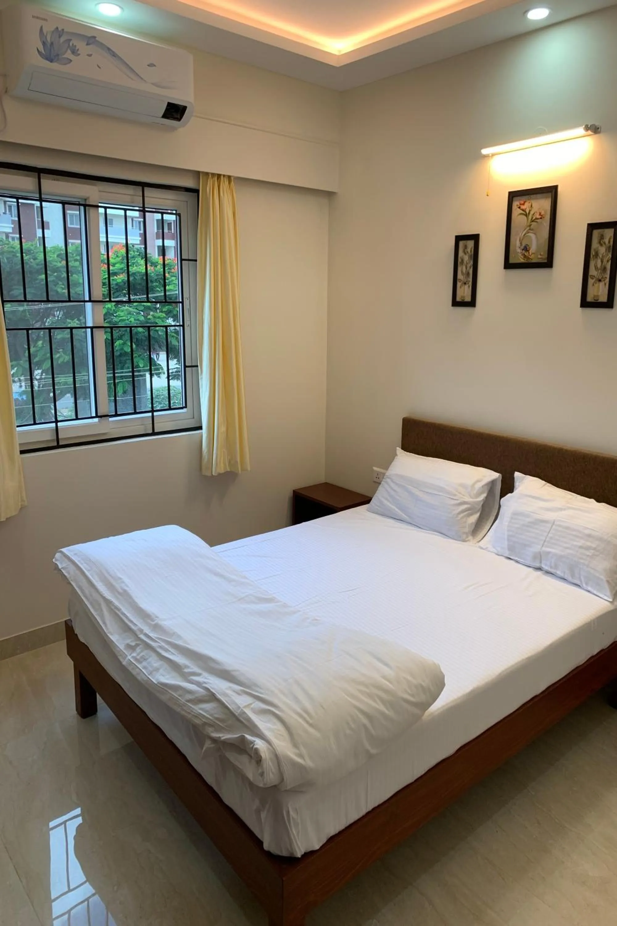 Bedroom, Bed in Vennela Hotel Apartments