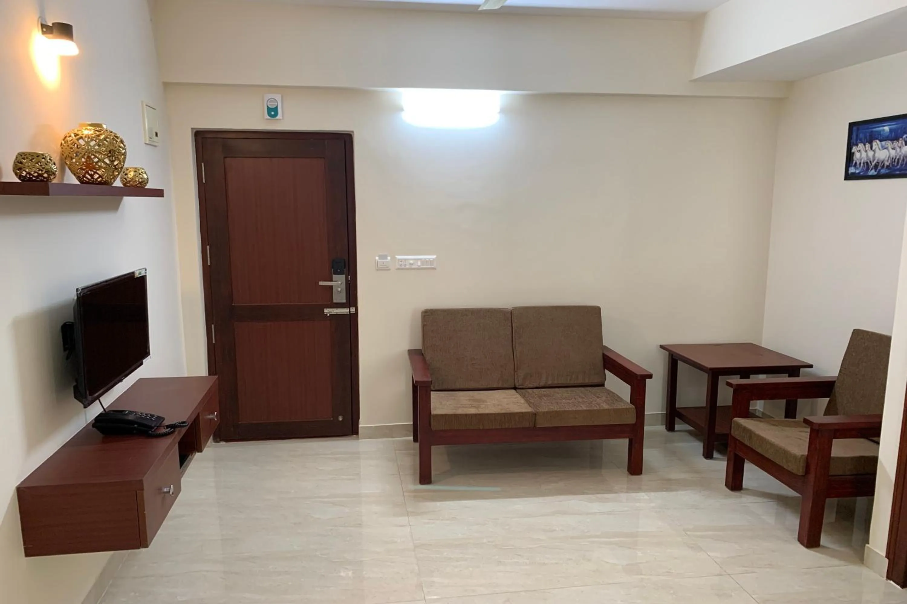 Living room in Vennela Hotel Apartments