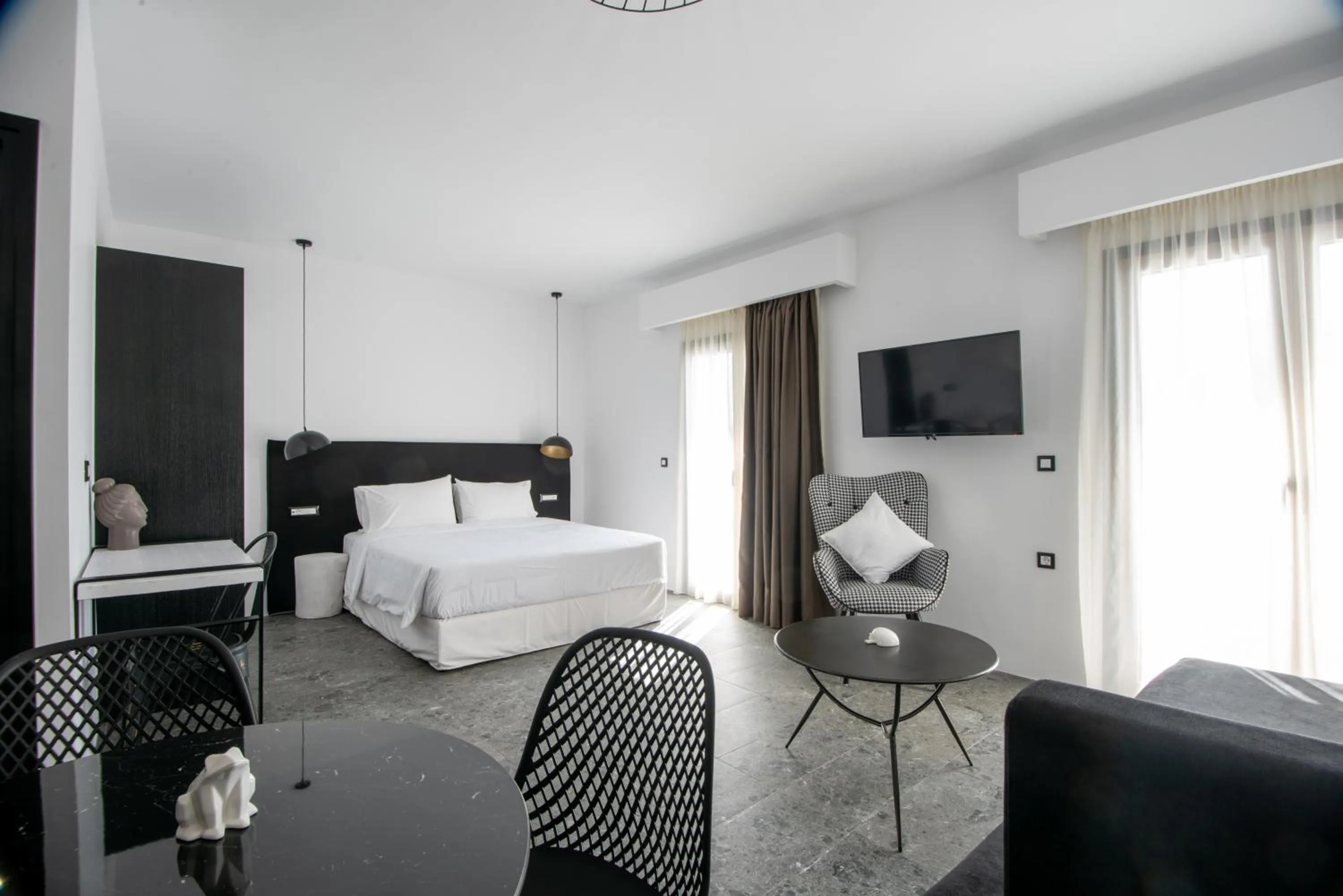 Bed in Kalypso Suites Hotel - Adults Only