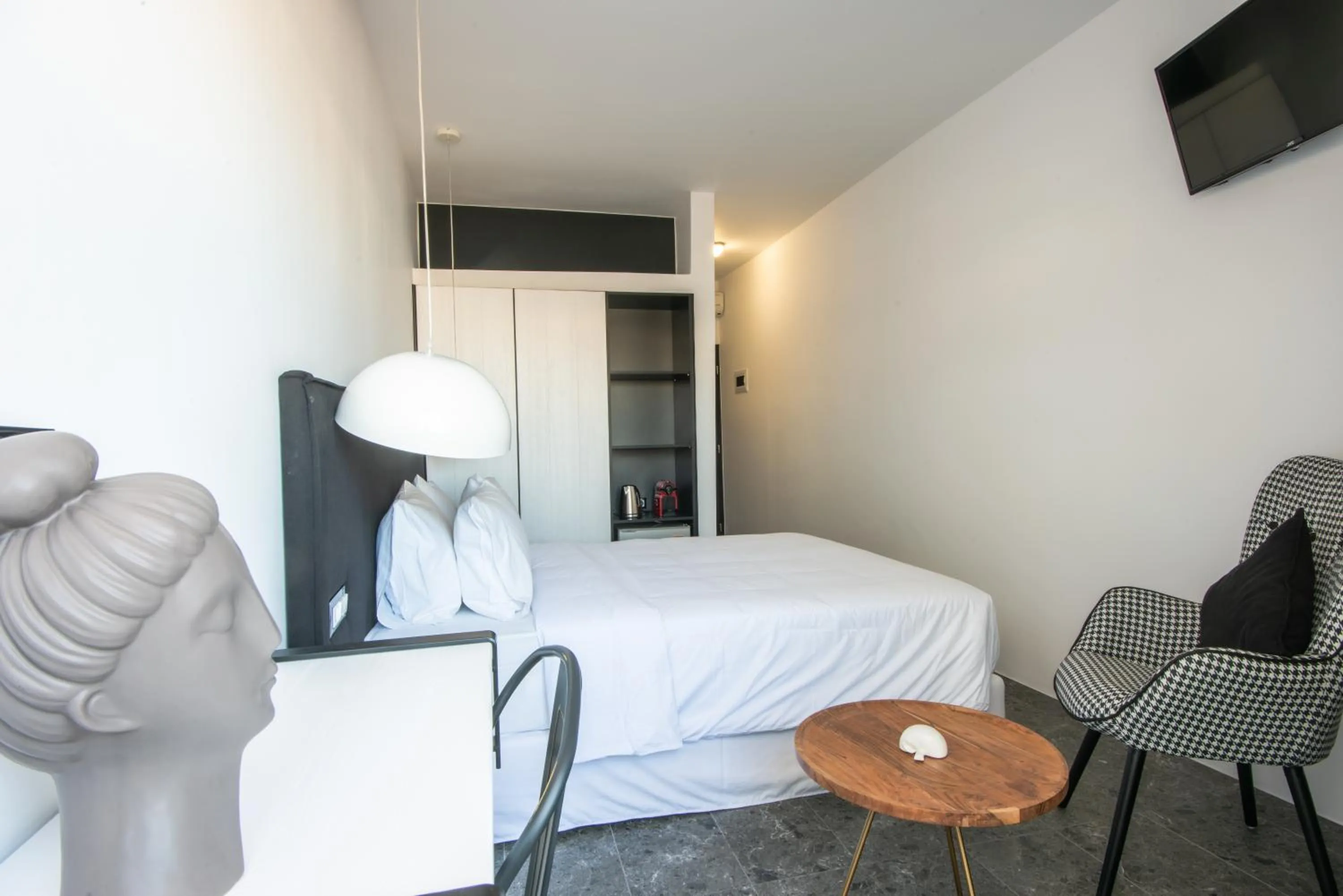 Photo of the whole room, Bed in Kalypso Suites Hotel - Adults Only