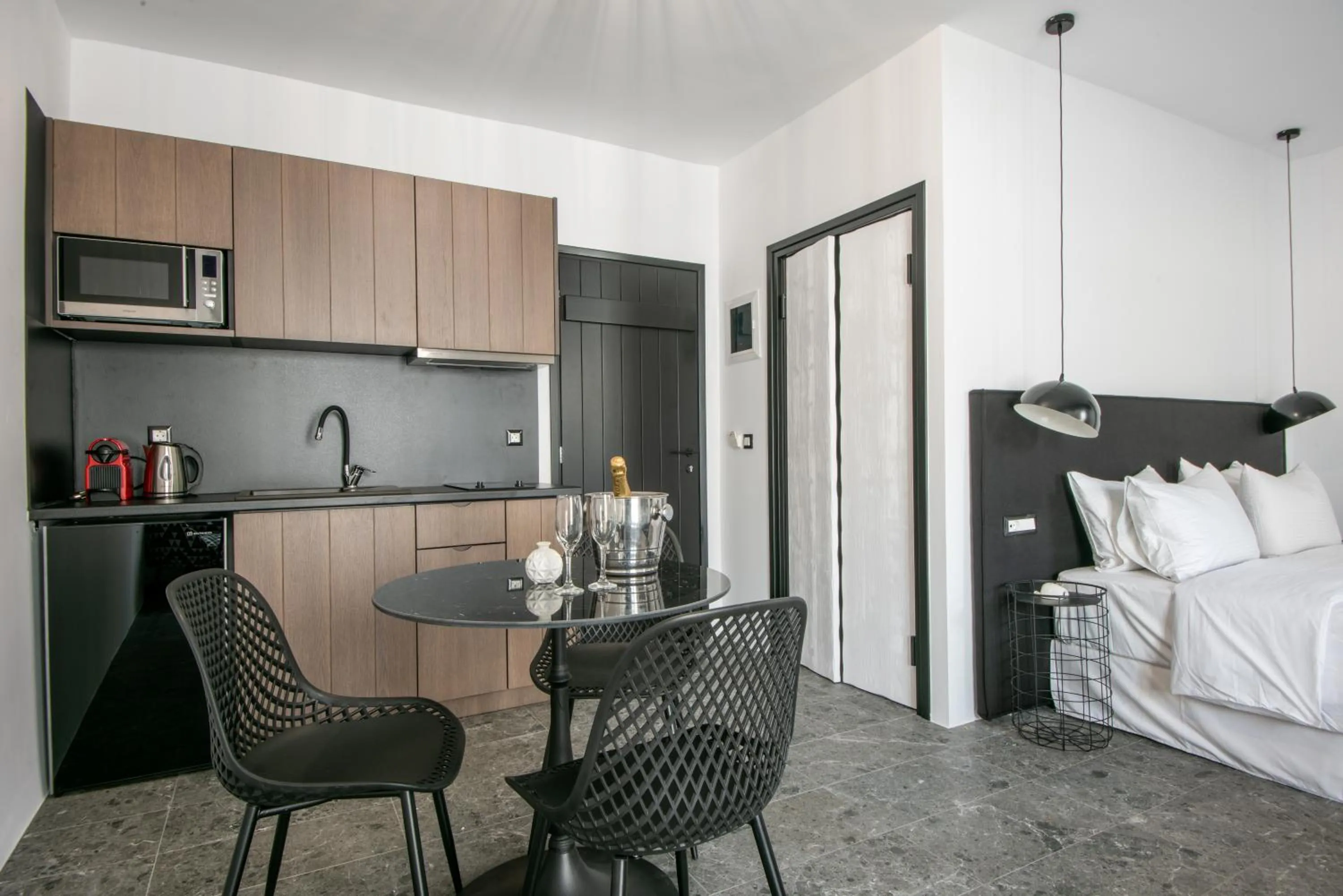 Coffee/tea facilities, Bed in Kalypso Suites Hotel - Adults Only