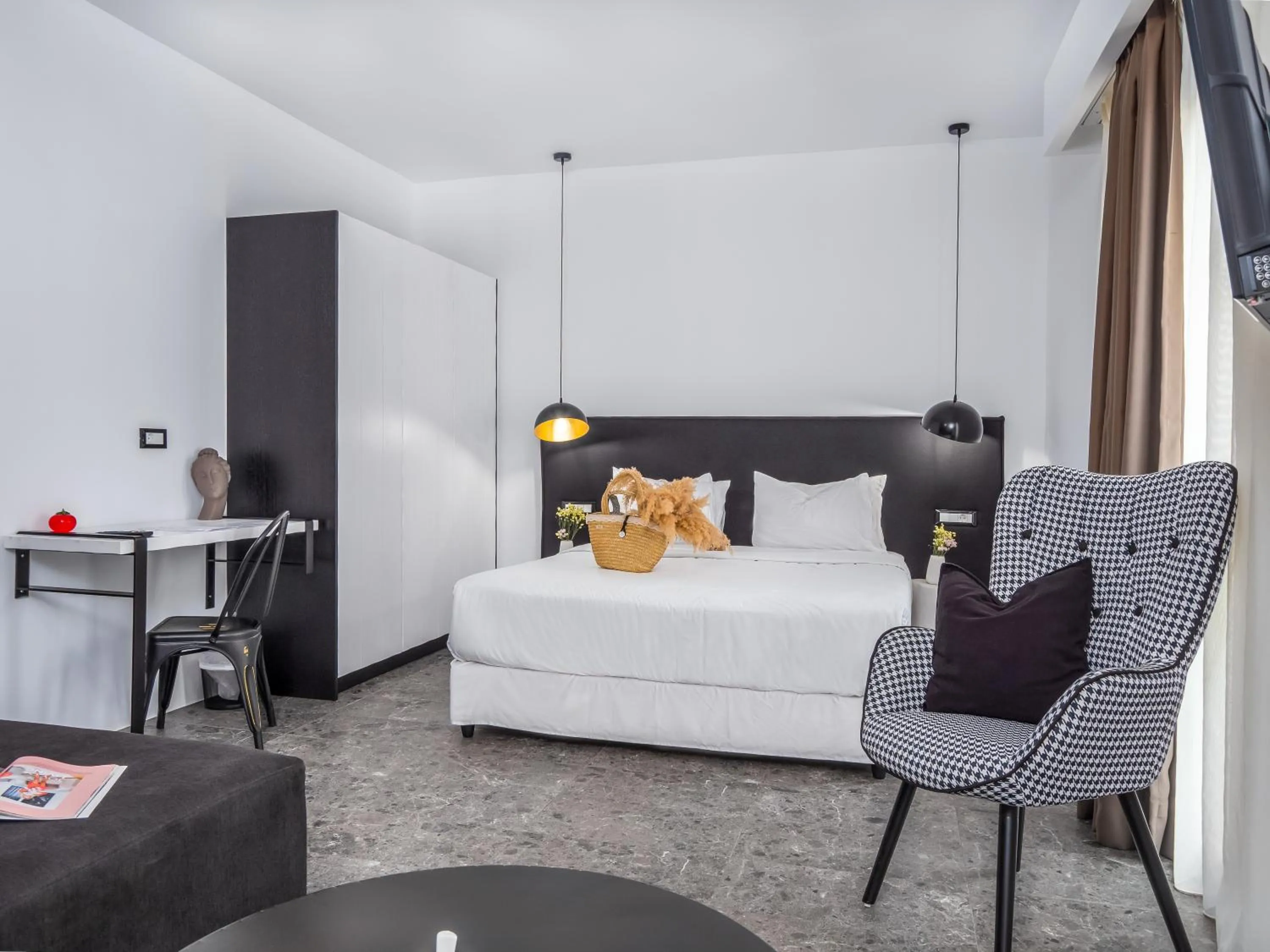 Bed in Kalypso Suites Hotel - Adults Only