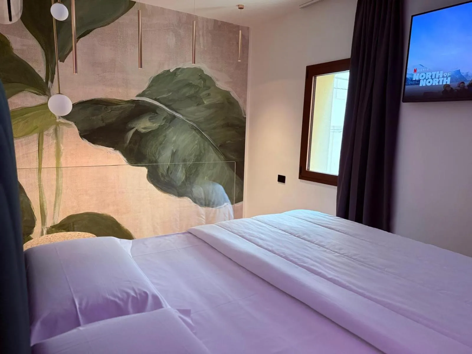 Bed in Krysos Luxury Rooms