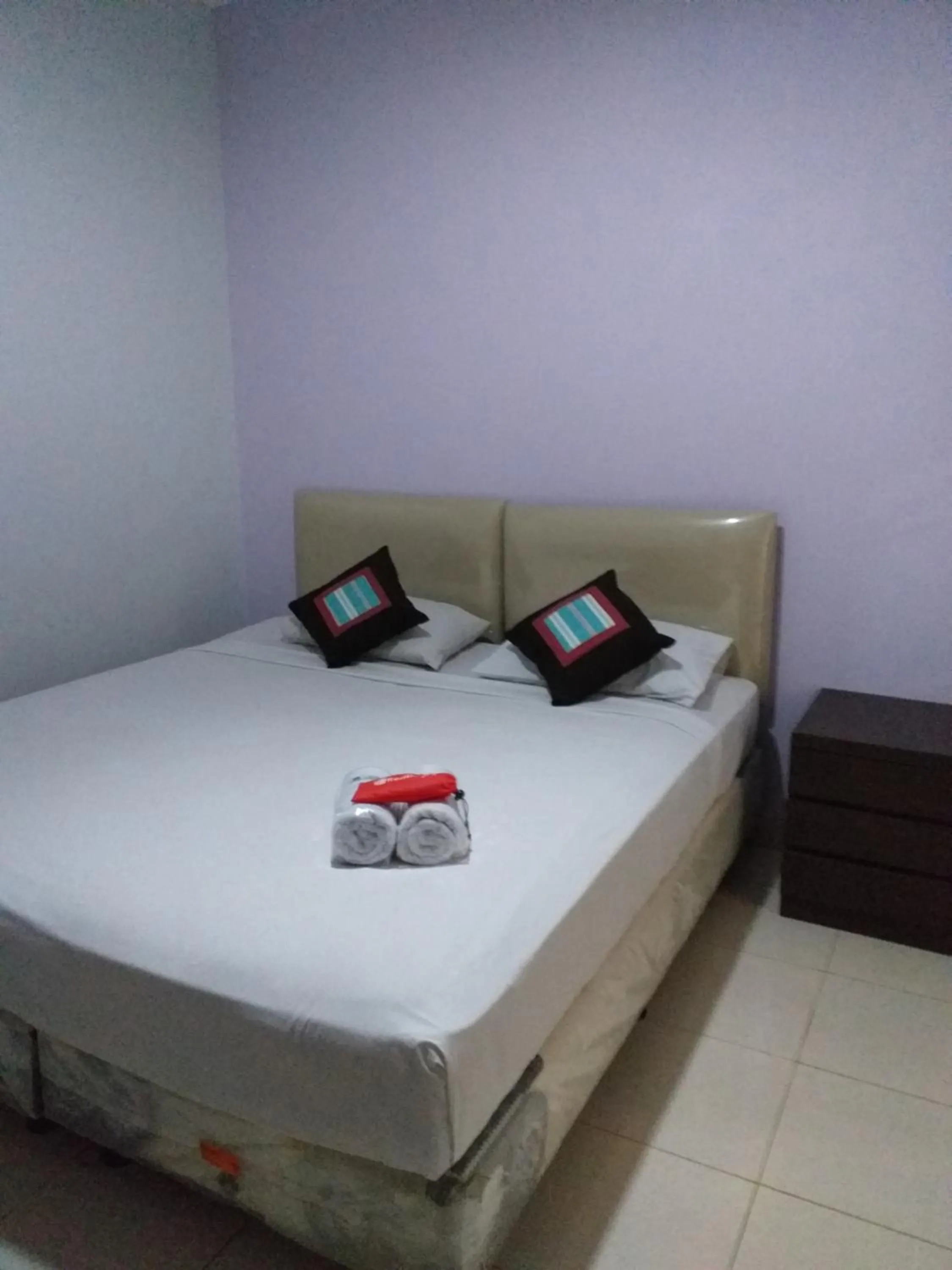 Bed in BLESSING RESIDENCE HOTEL