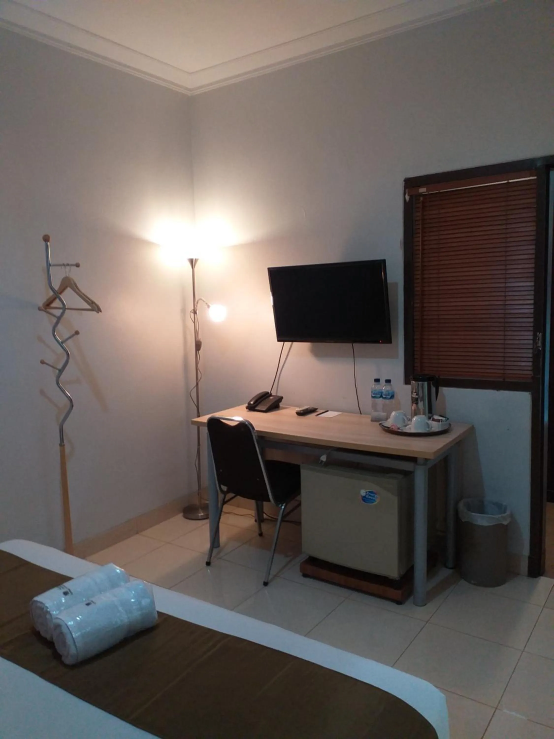 Bed in BLESSING RESIDENCE HOTEL