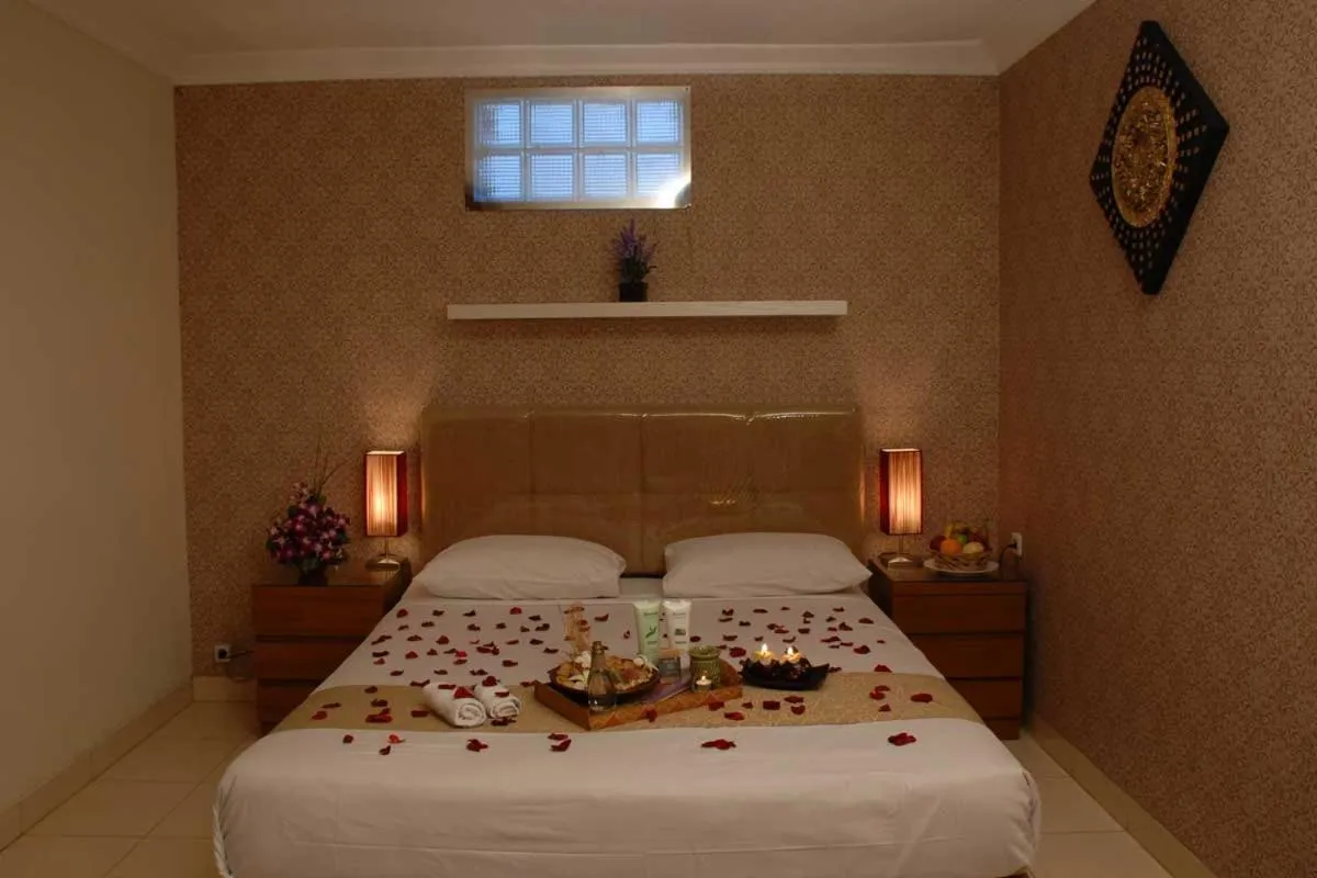 Bed in BLESSING RESIDENCE HOTEL