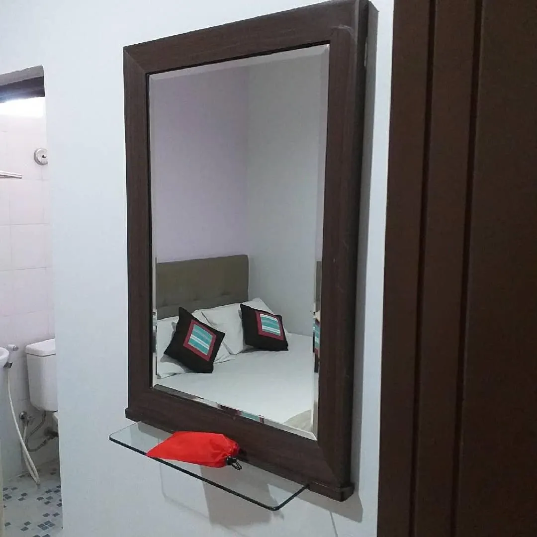 Bed in BLESSING RESIDENCE HOTEL