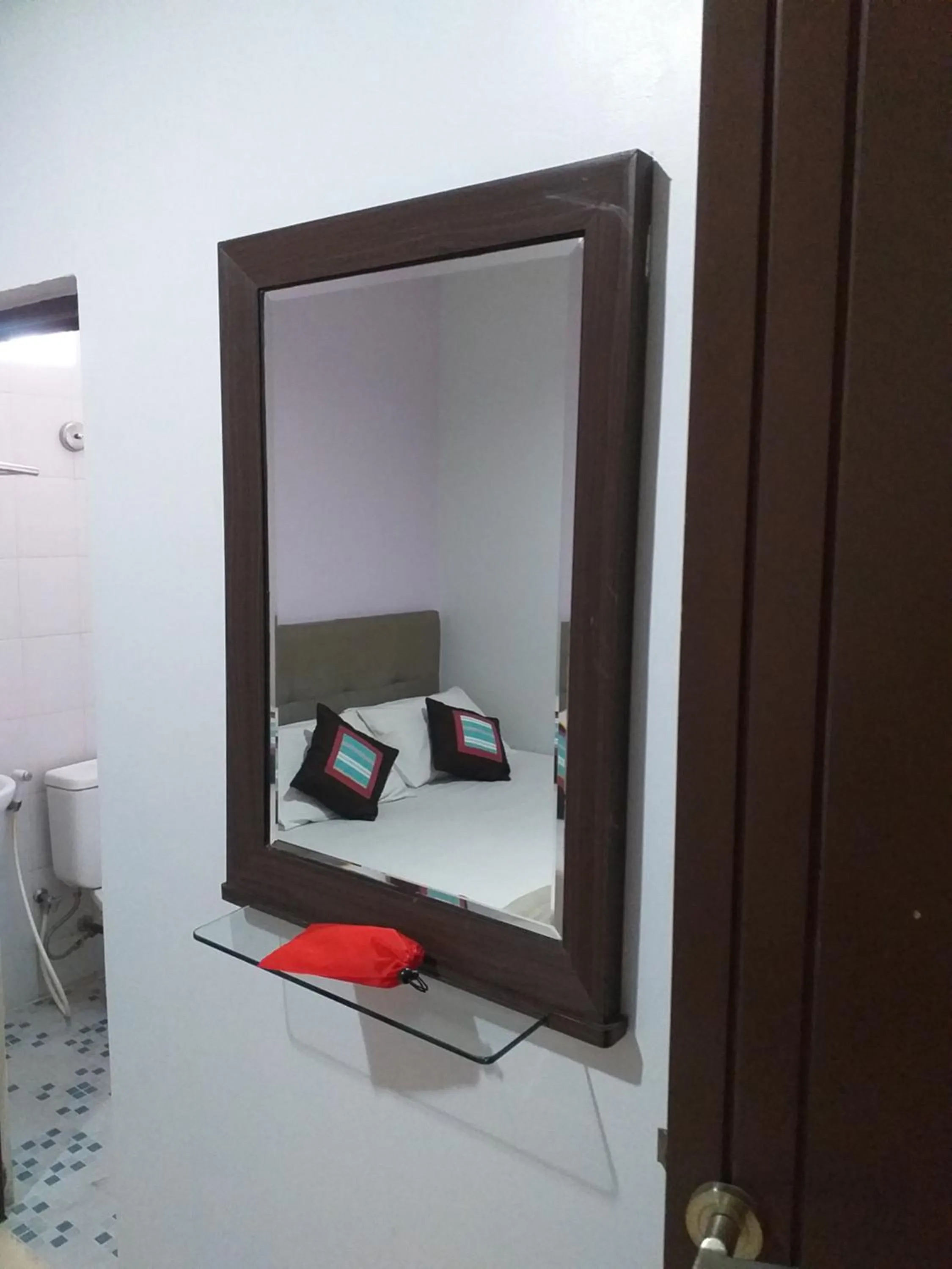 Bed in BLESSING RESIDENCE HOTEL