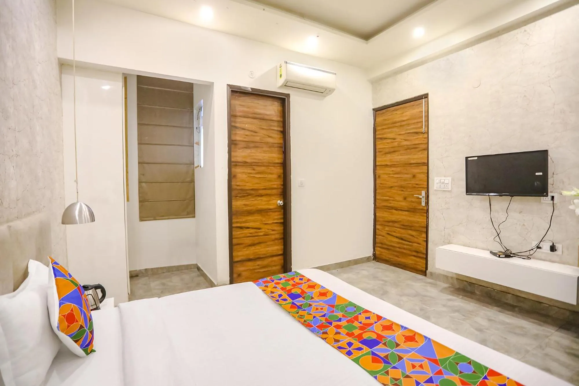 Bed in FabHotel F9 Sector 19