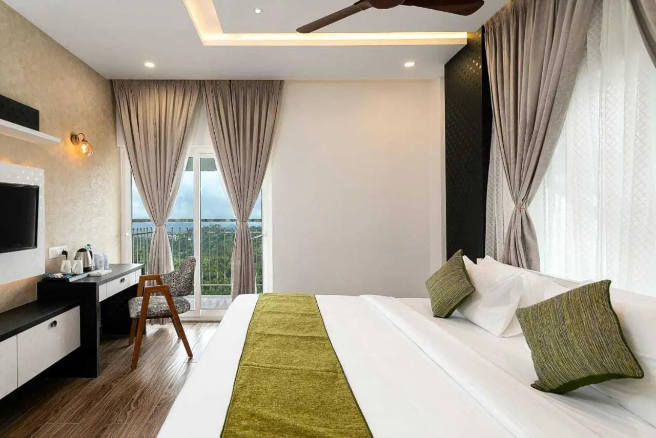 Bed in Ramee Wolkenburg Resort & Spa, Munnar