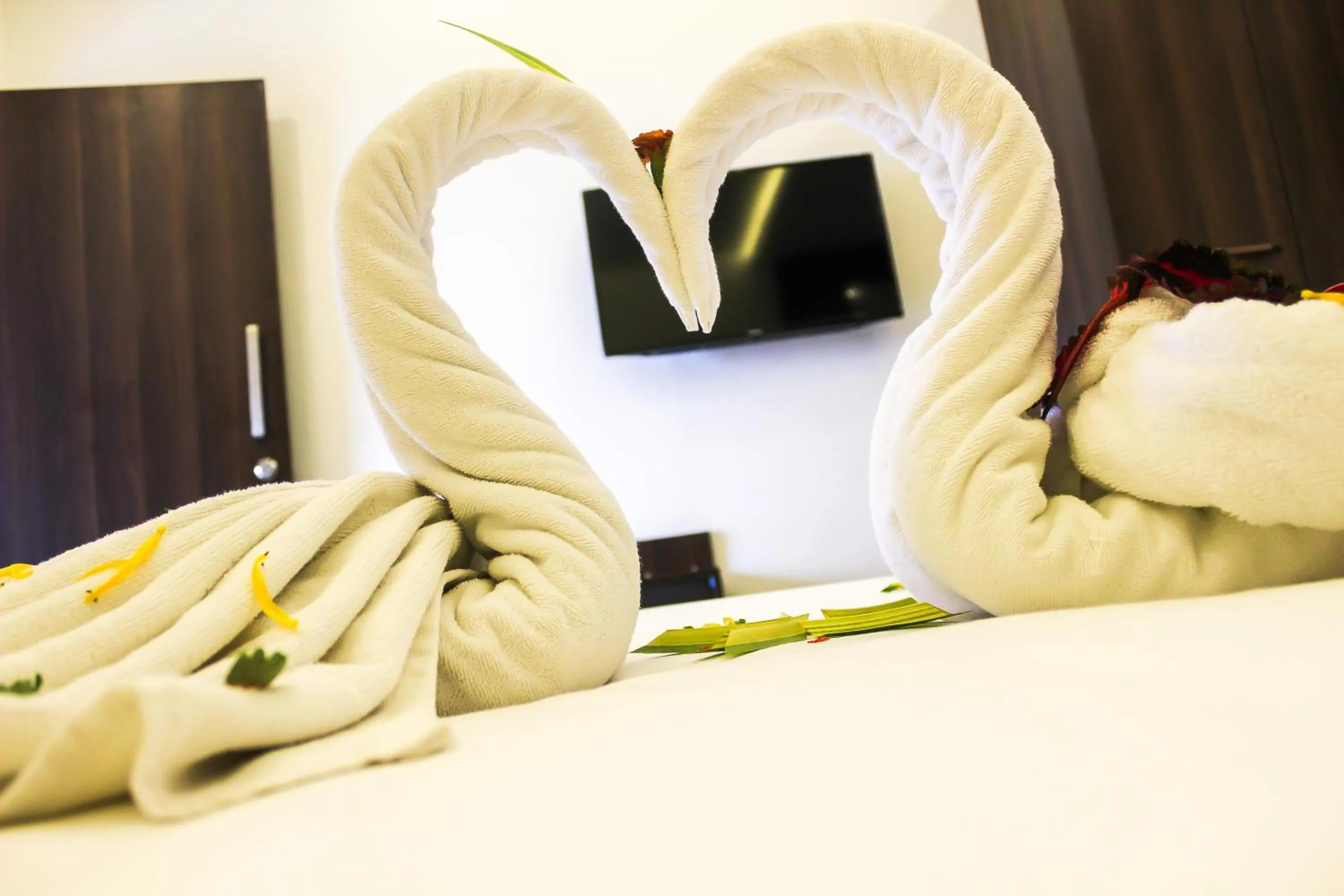 Bed in Ramee Wolkenburg Resort & Spa, Munnar